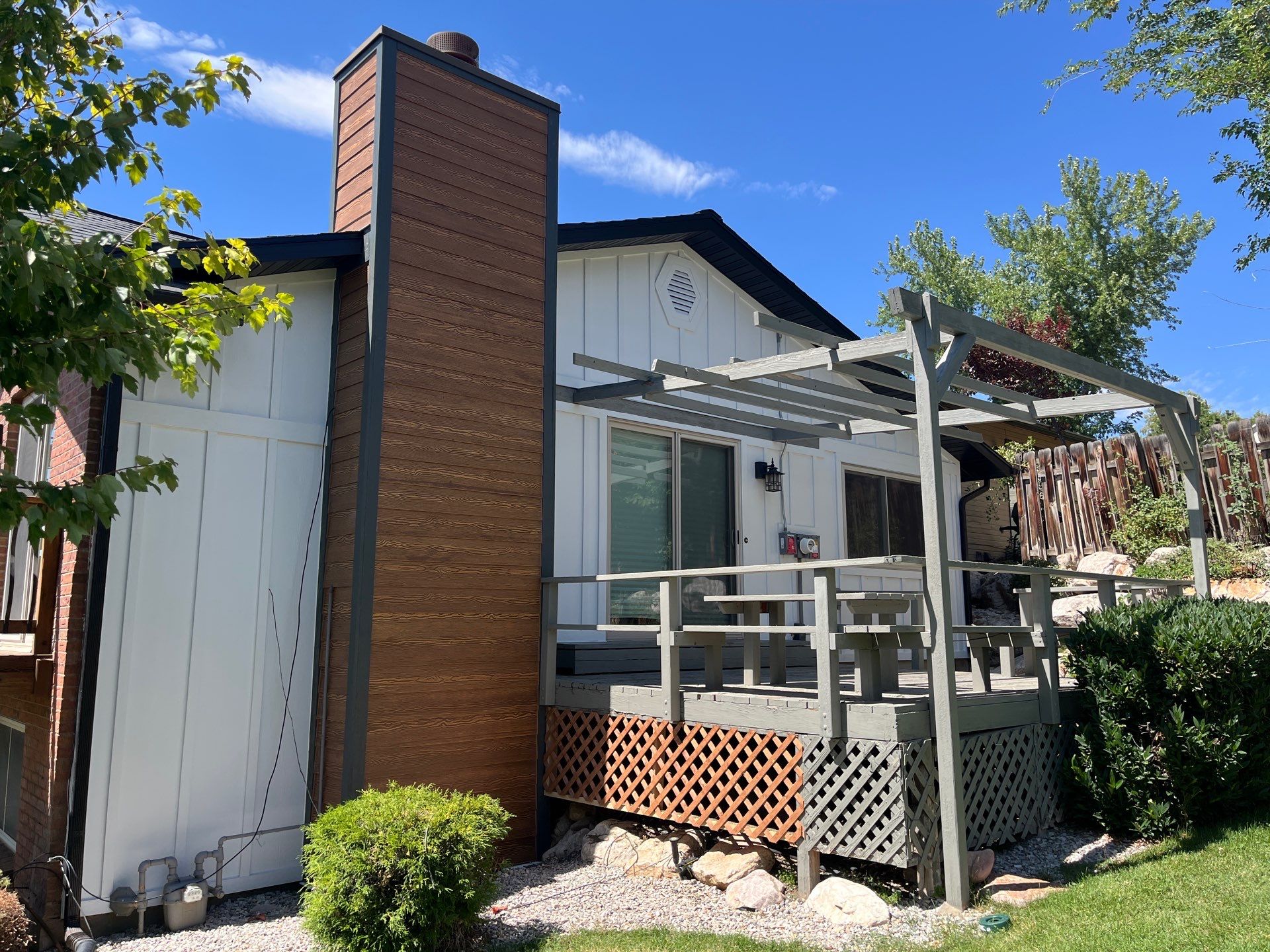 North Ogden | Hardie B&B & Wood-Tone Accent | Arctic White by Ideal Siding Utah