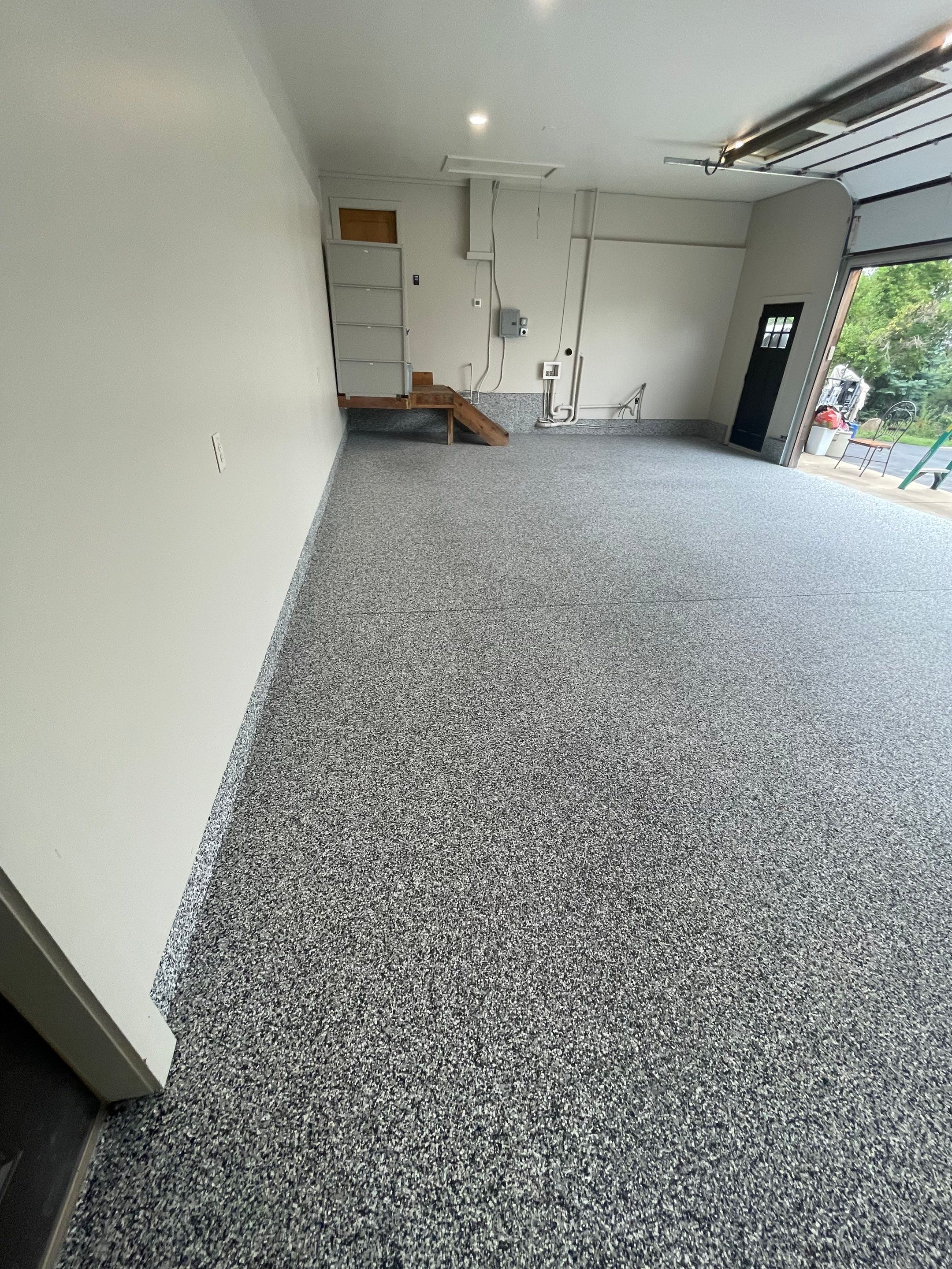 Domino Flake Floor Coating and Crack Repair in Chancellor by Select Painting, Coatings & Garage Cabinets