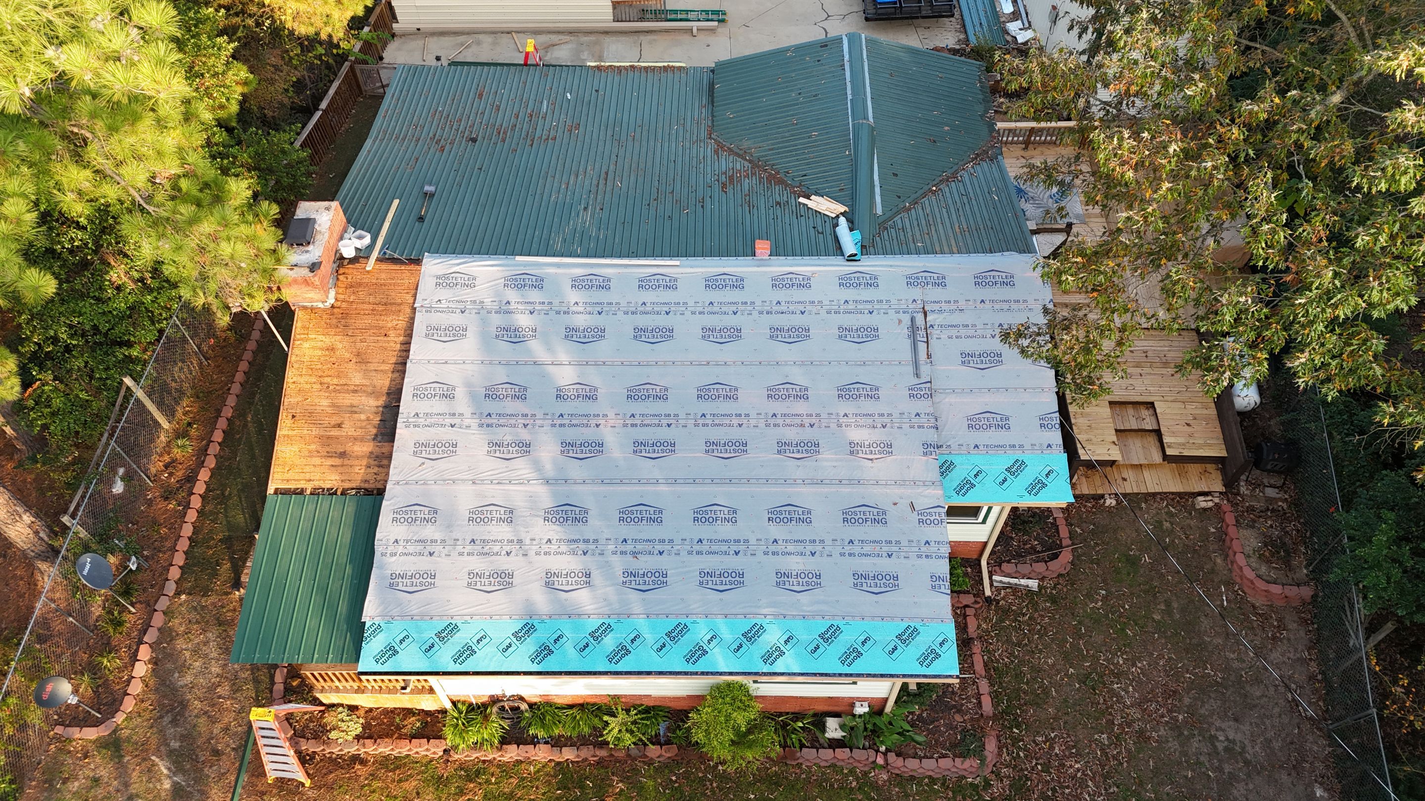 Residential Metal Roof Replacement using 26 Gauge Colored Panels by Hostetler Roofing