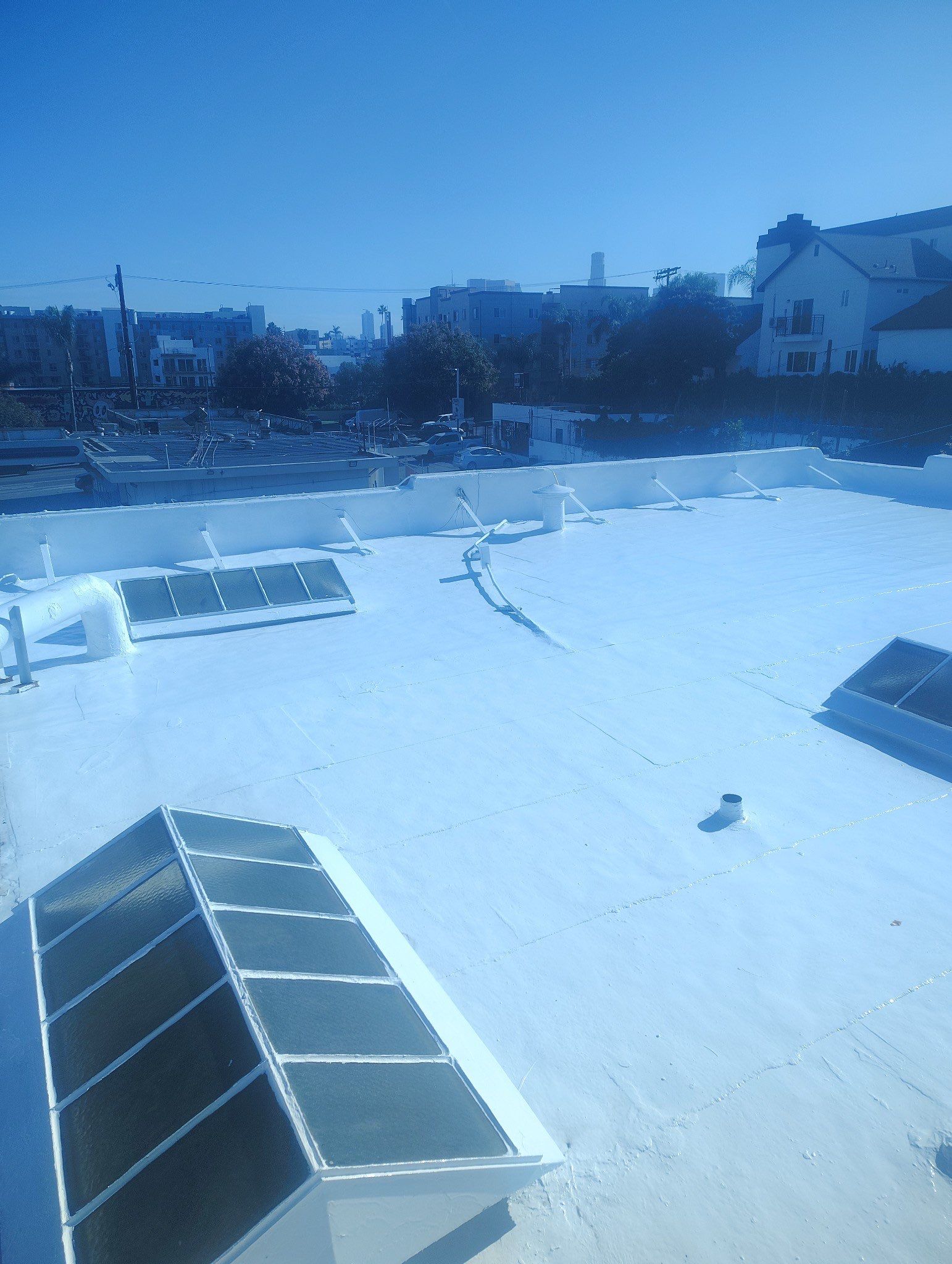 Commercial Roofing Installation using ASC Silicone Membrane by Hull Brothers Roofing