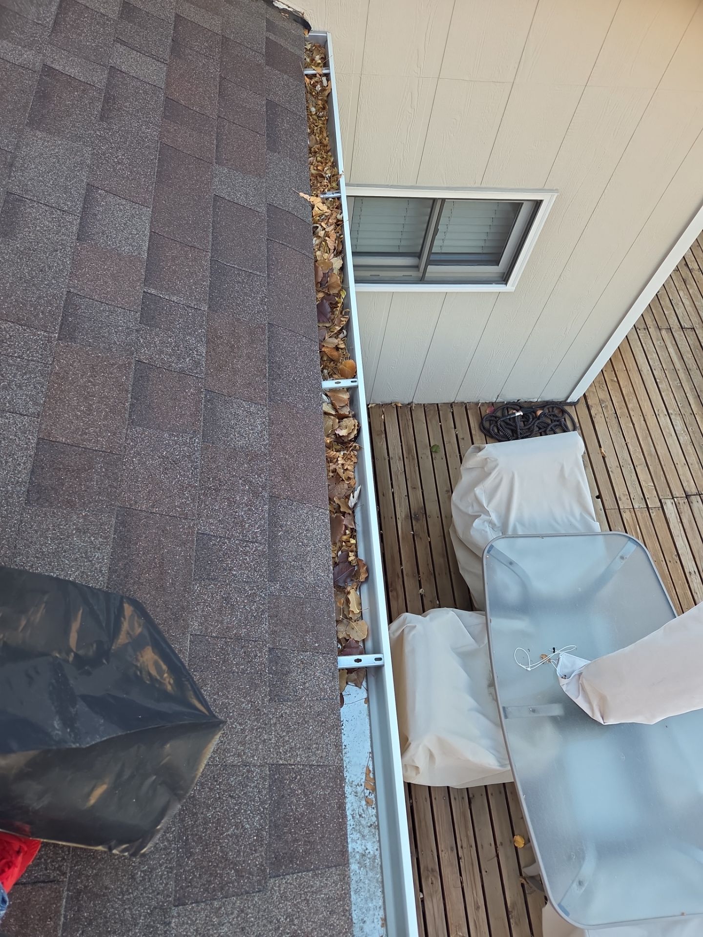 Clean Gutter and Downspouts by RTP Roofing Company