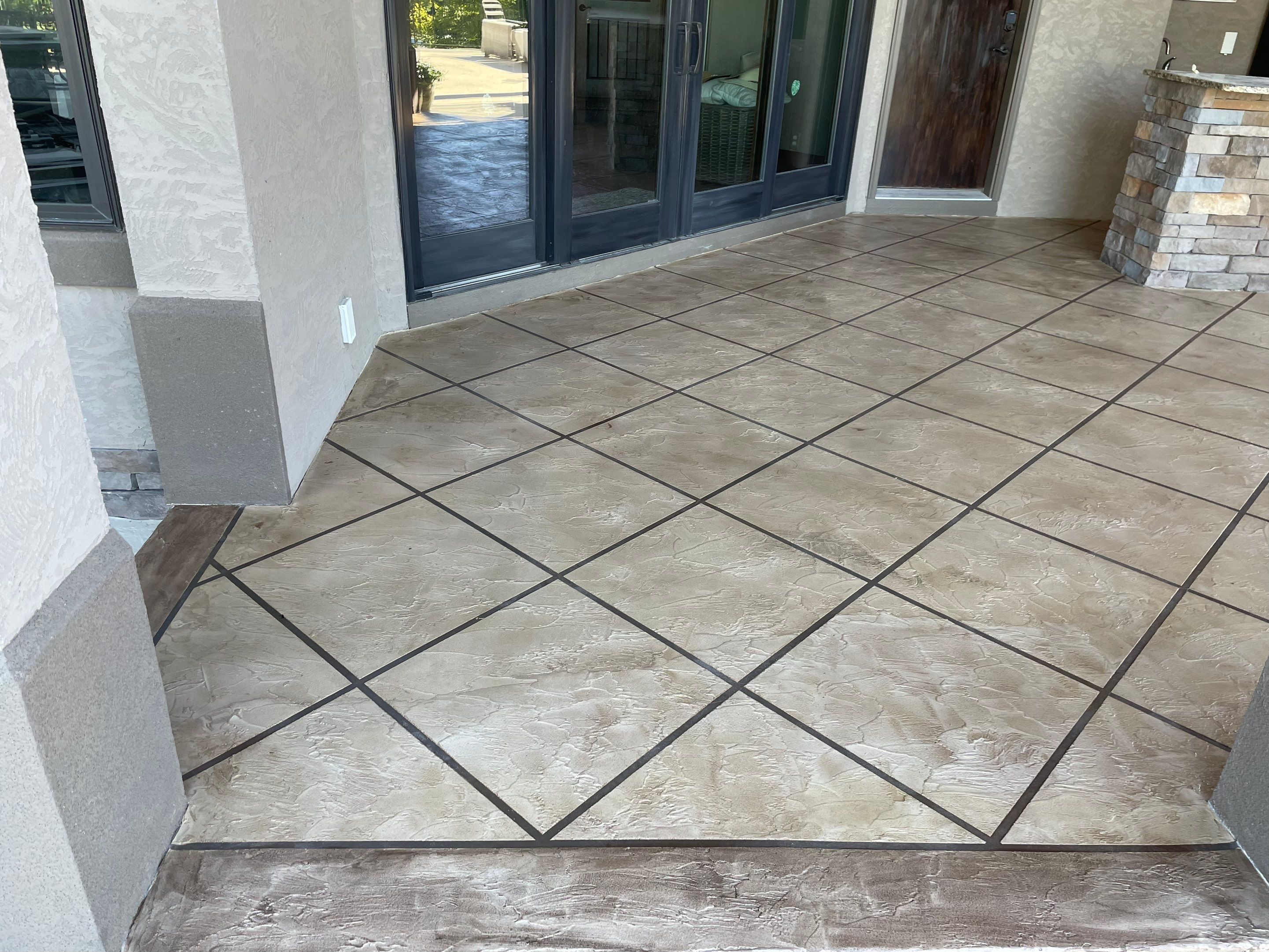 Lake Lotawana -- Front Walkway and Back Patio Tuscan Overlay by Big Red Decorative Concrete, LLC