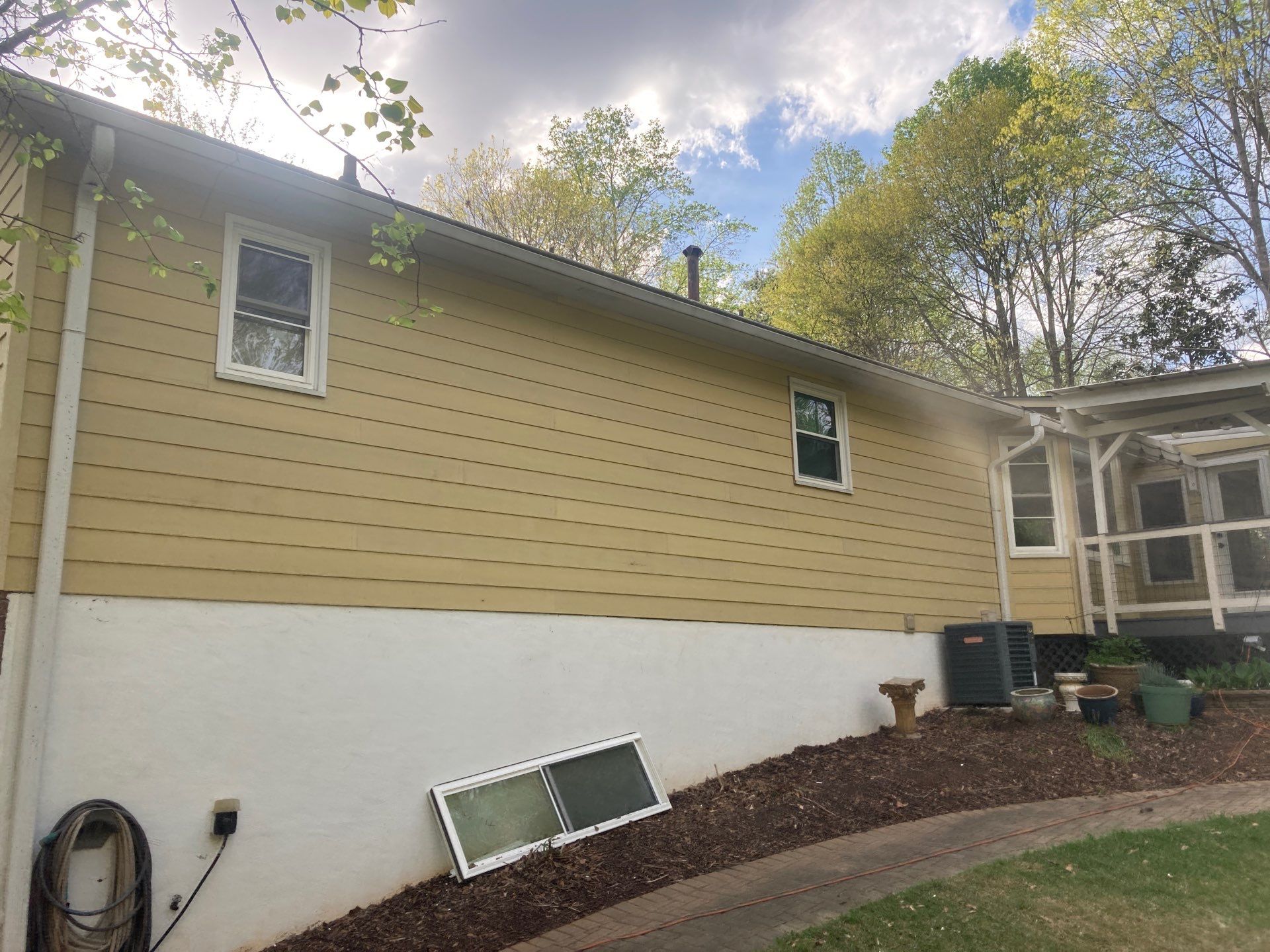 Window, Siding, & Rotten Wood Replacement with Exterior Painting in Woodstock, GA by Nelson Exteriors 
