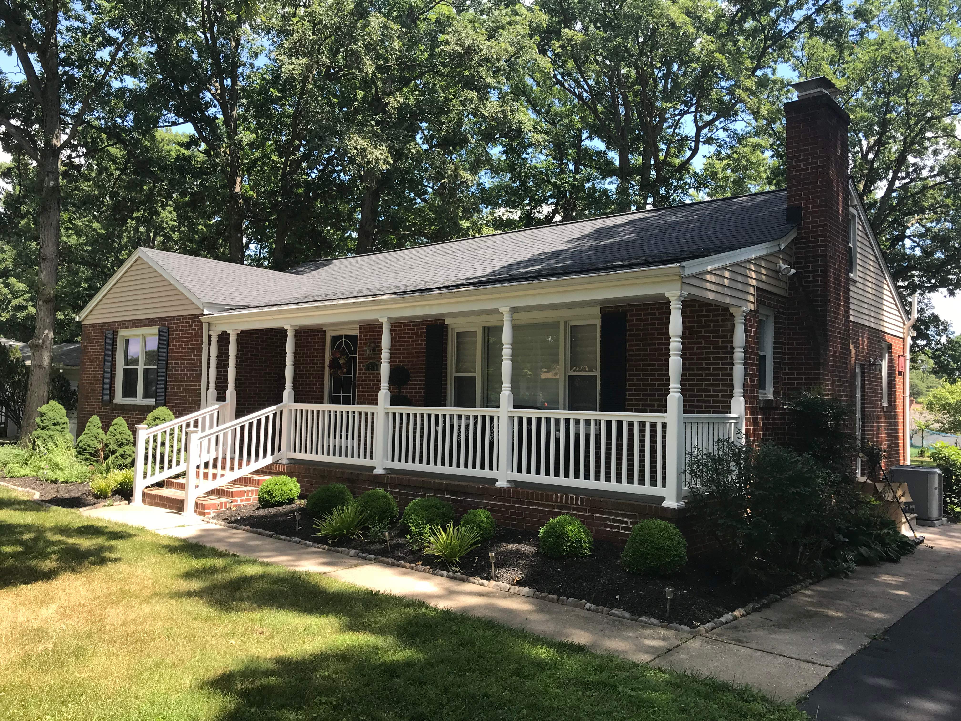 Residential Roofing Installation using Charcoal Black by Alpha Design Services