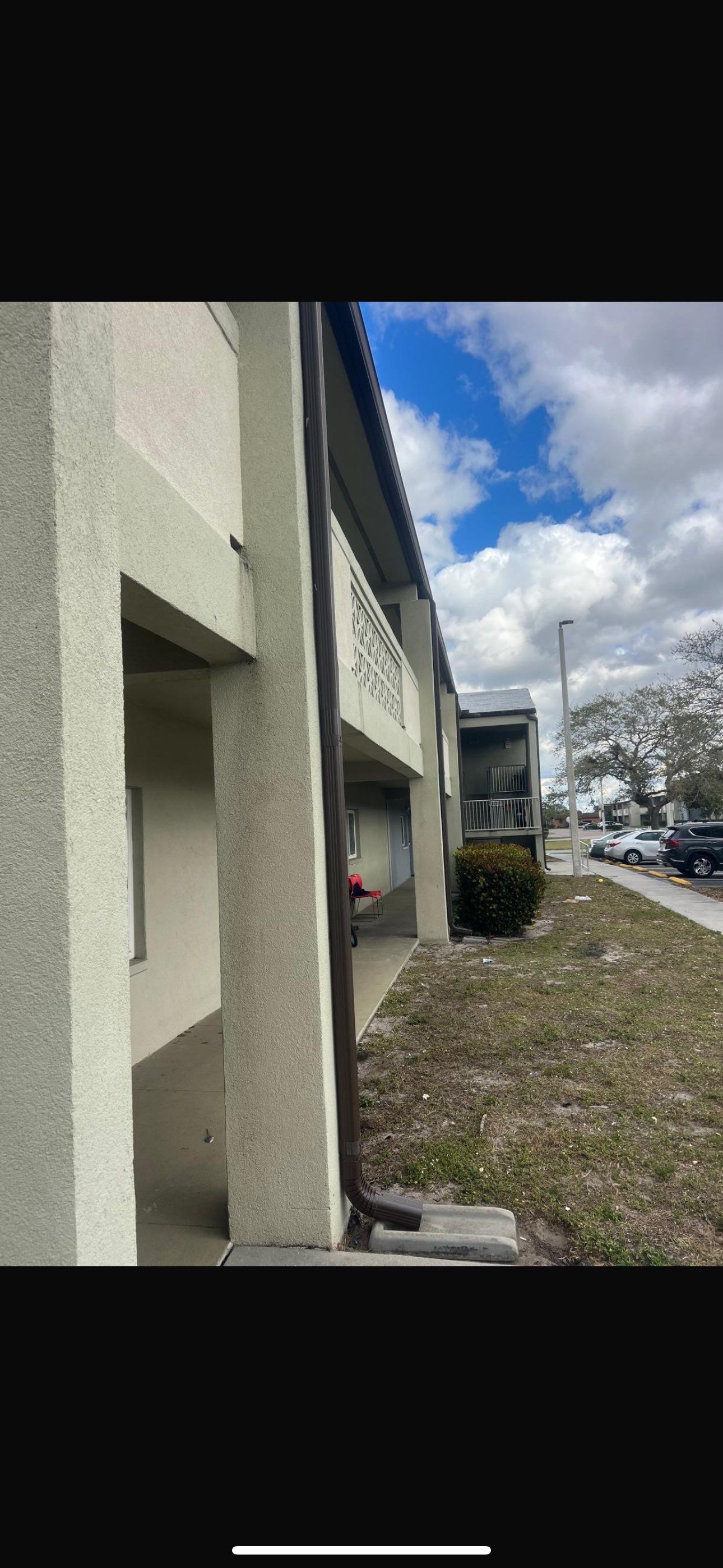 Bronze Downspouts Installation in Fort Myers FL by Gutter Professors