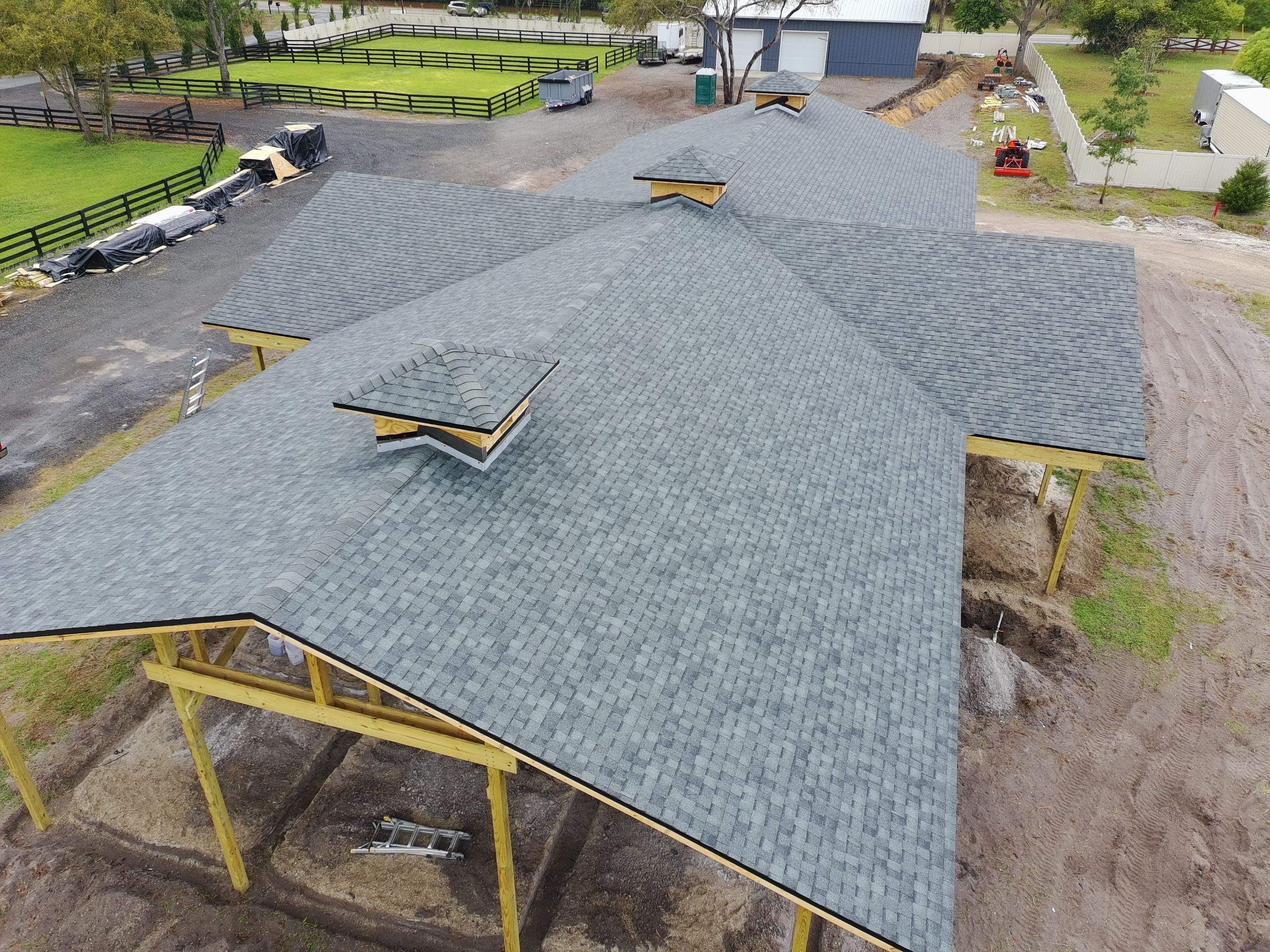 Custom Post-Frame Horse Barn and Shingle Roof Installation in Geneva by Fortified Roofing Solutions Corp.