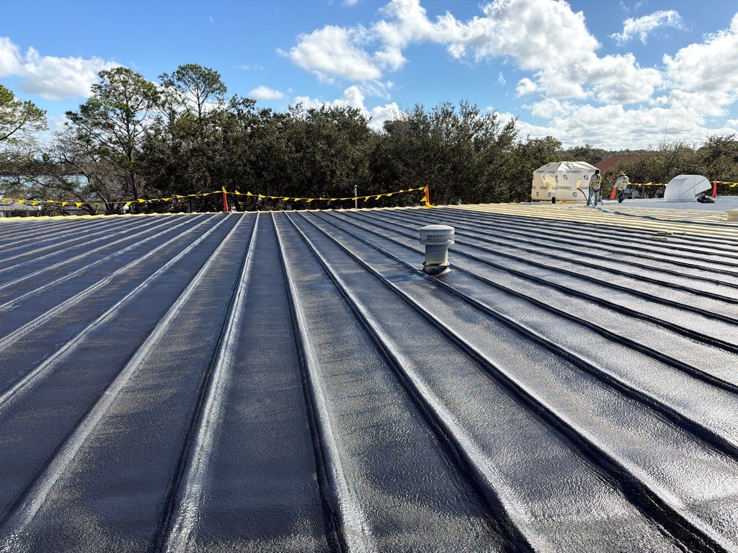 Sarasota Industrial Warehouse Metal Roof Silicone Coating Restoration by CES Roofing