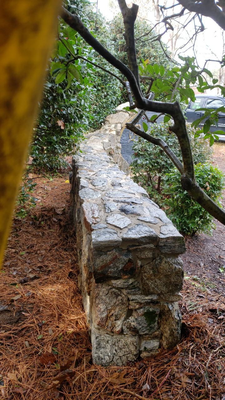 Neighberhood entrance sign cleaing using cleaner by Power Wash Masters LLC