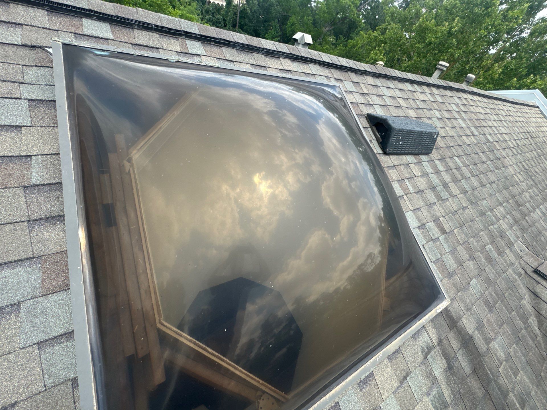Chimney Leak Repair & Skylight Leak Repair  by Associates Roofing Unlimited 