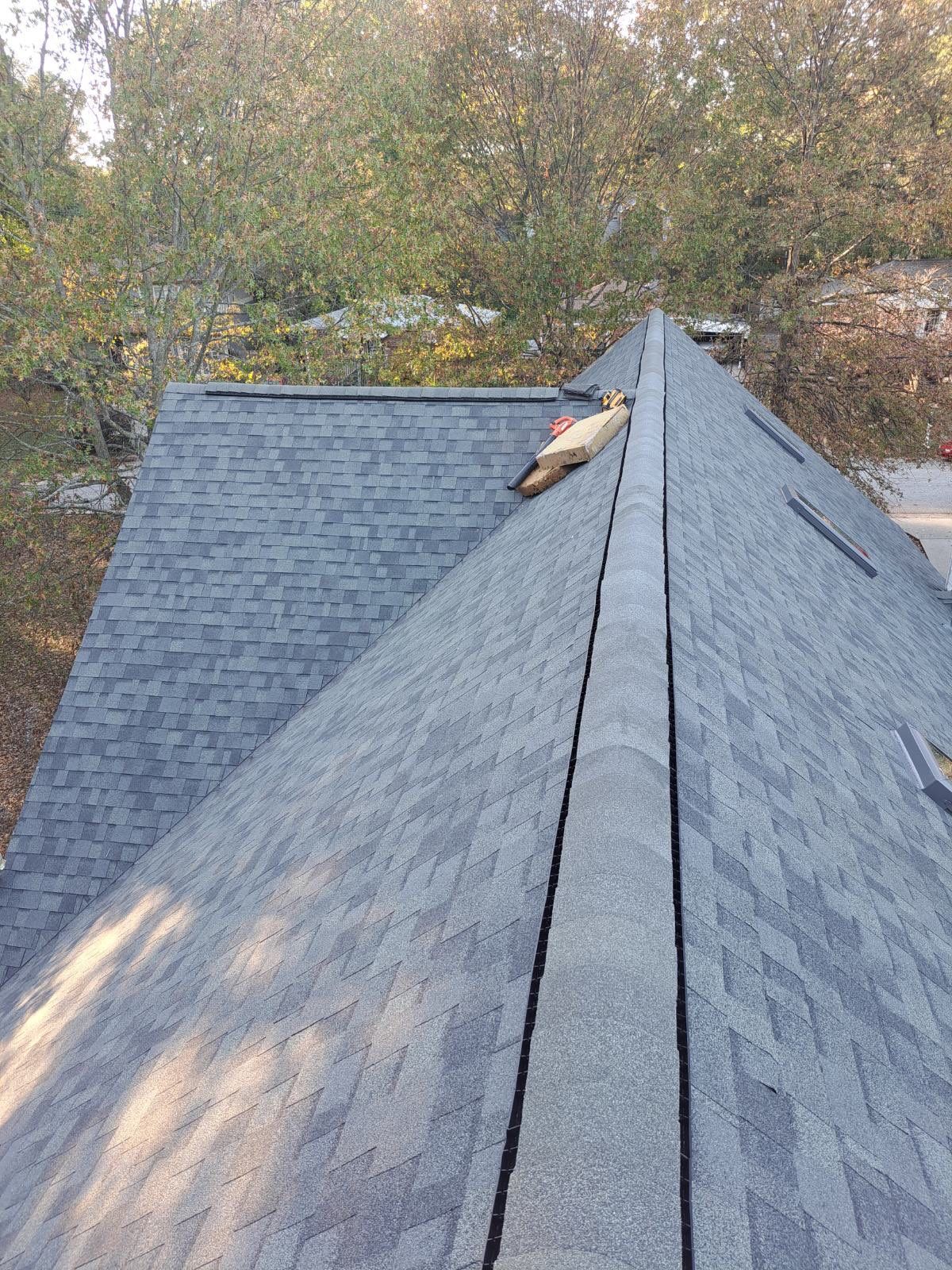 Skylight install & Roof Replacement by Nailed It Roofing & Remodeling LLC