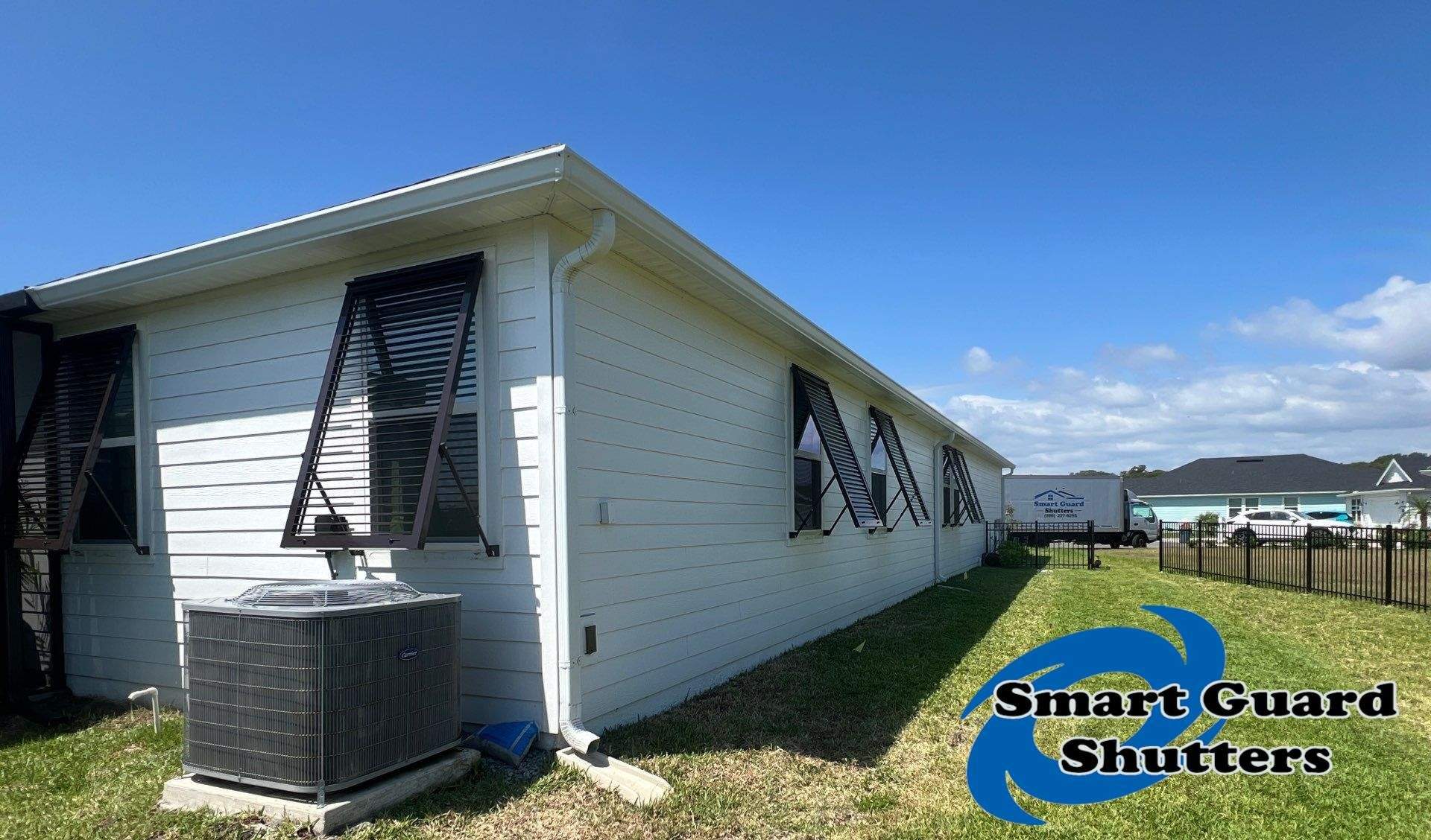 Impact Bahamas In Grey Brown by Smart Guard Shutters