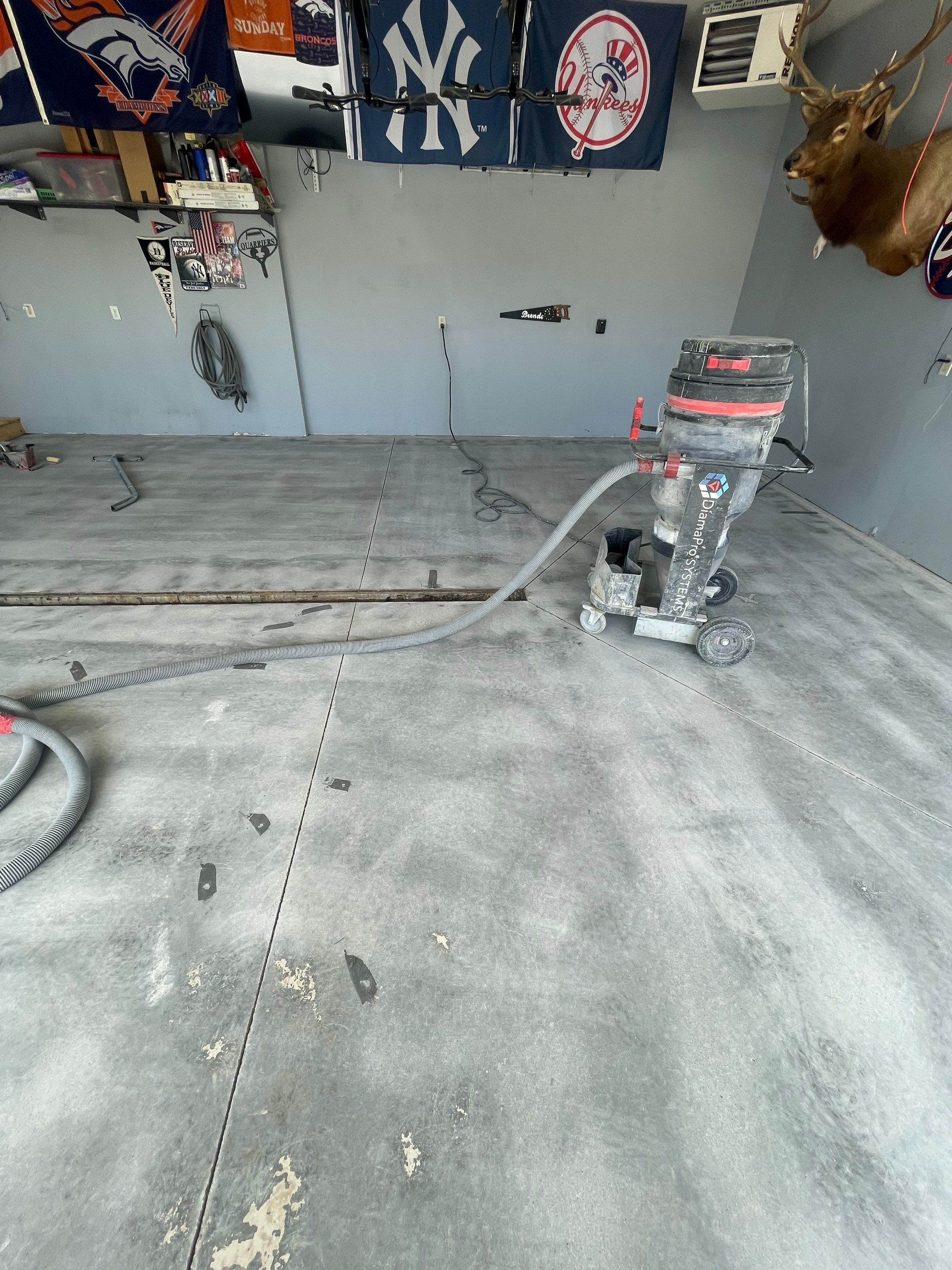 Full Garage Floor Epoxy Coating Installation in Dell Rapids by Select Painting, Coatings & Garage Cabinets
