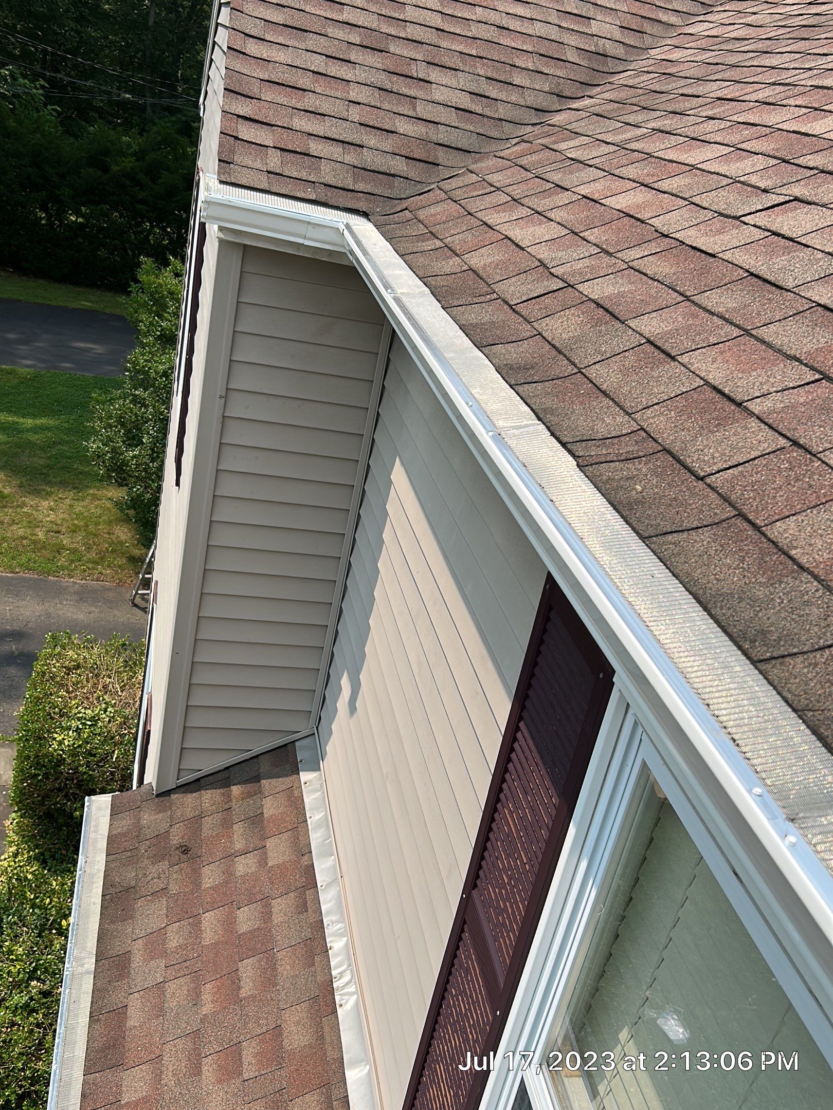 Gutter Installation using 5k White gutters by A Plus Exterior