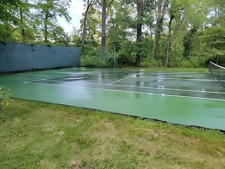 Deck, Patio, and Tennis Court Cleaning by Northern Power Washing LLC.