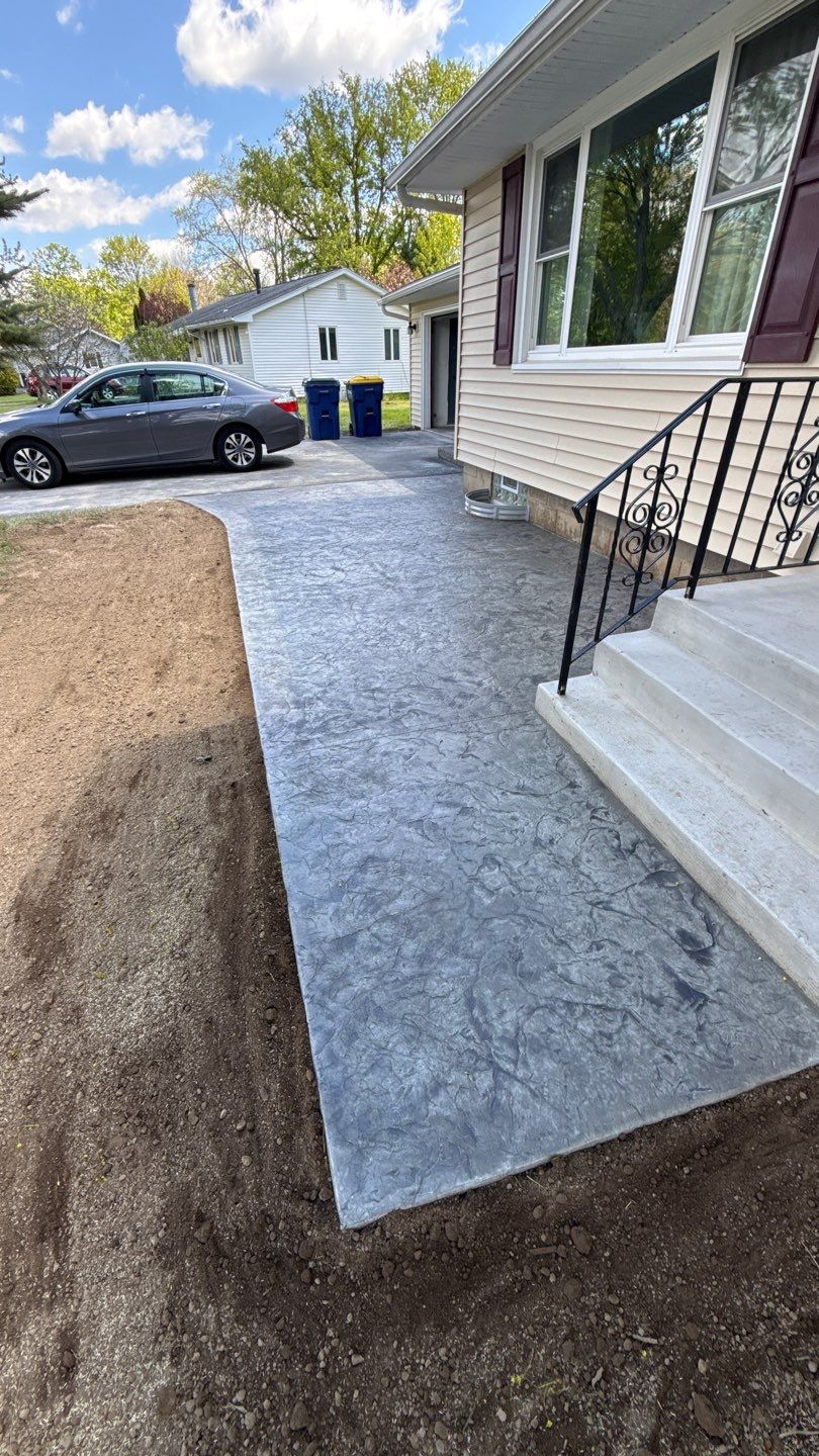 Oxford slate textured patio and step  by NG Masonry & Construction LLC