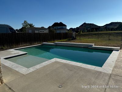 Crisp Geometric Pool with Sun Shelf