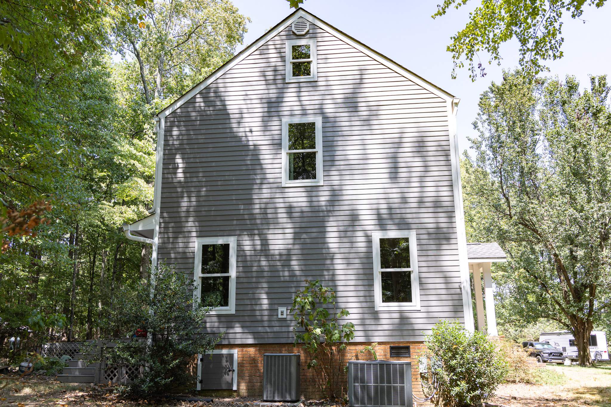 Aged Pewter Hardie + Windows by Freedom Exteriors