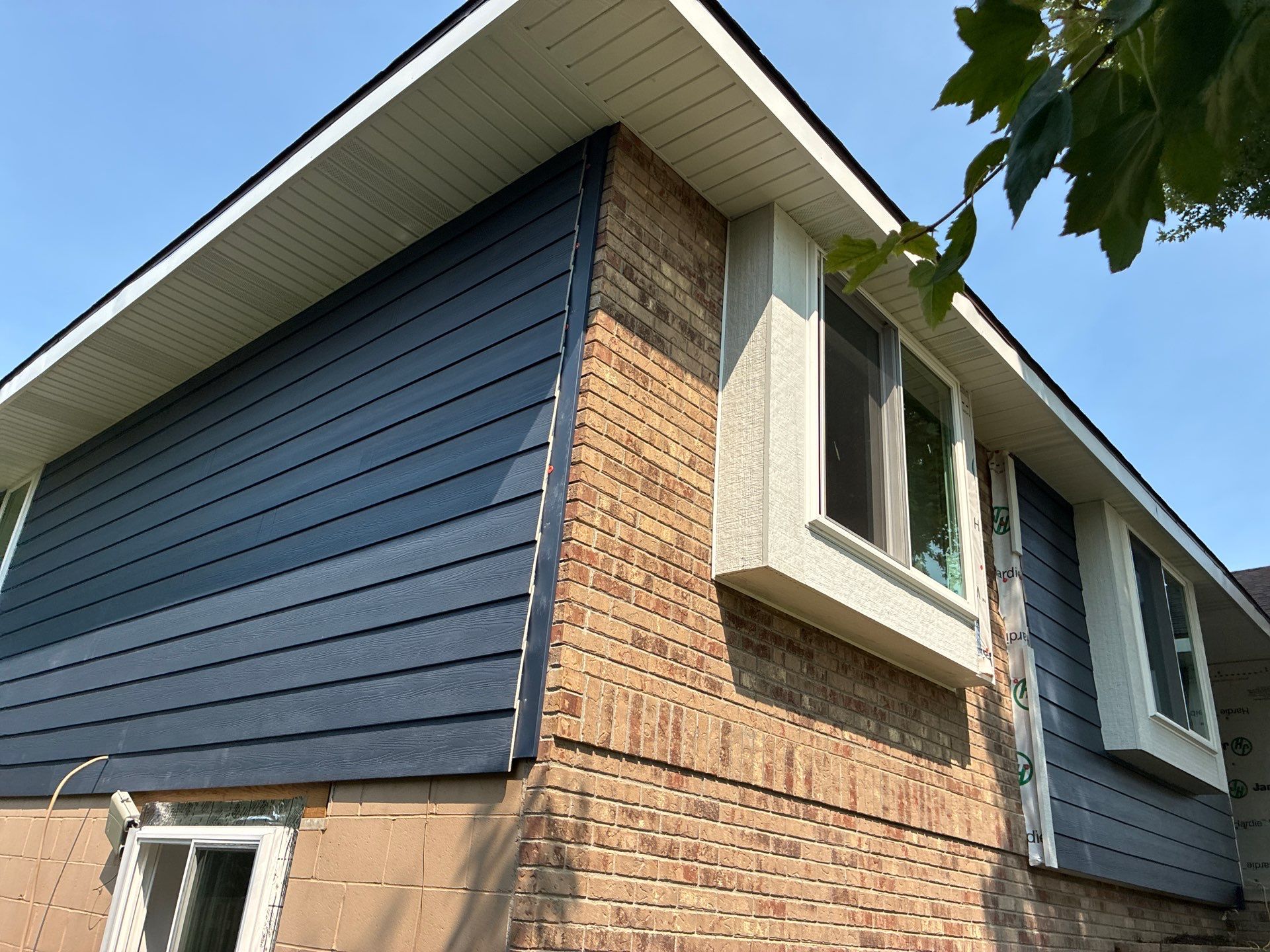 Full Window Replacement and James Hardie Siding Update in Papillion by Carps Complete Exteriors