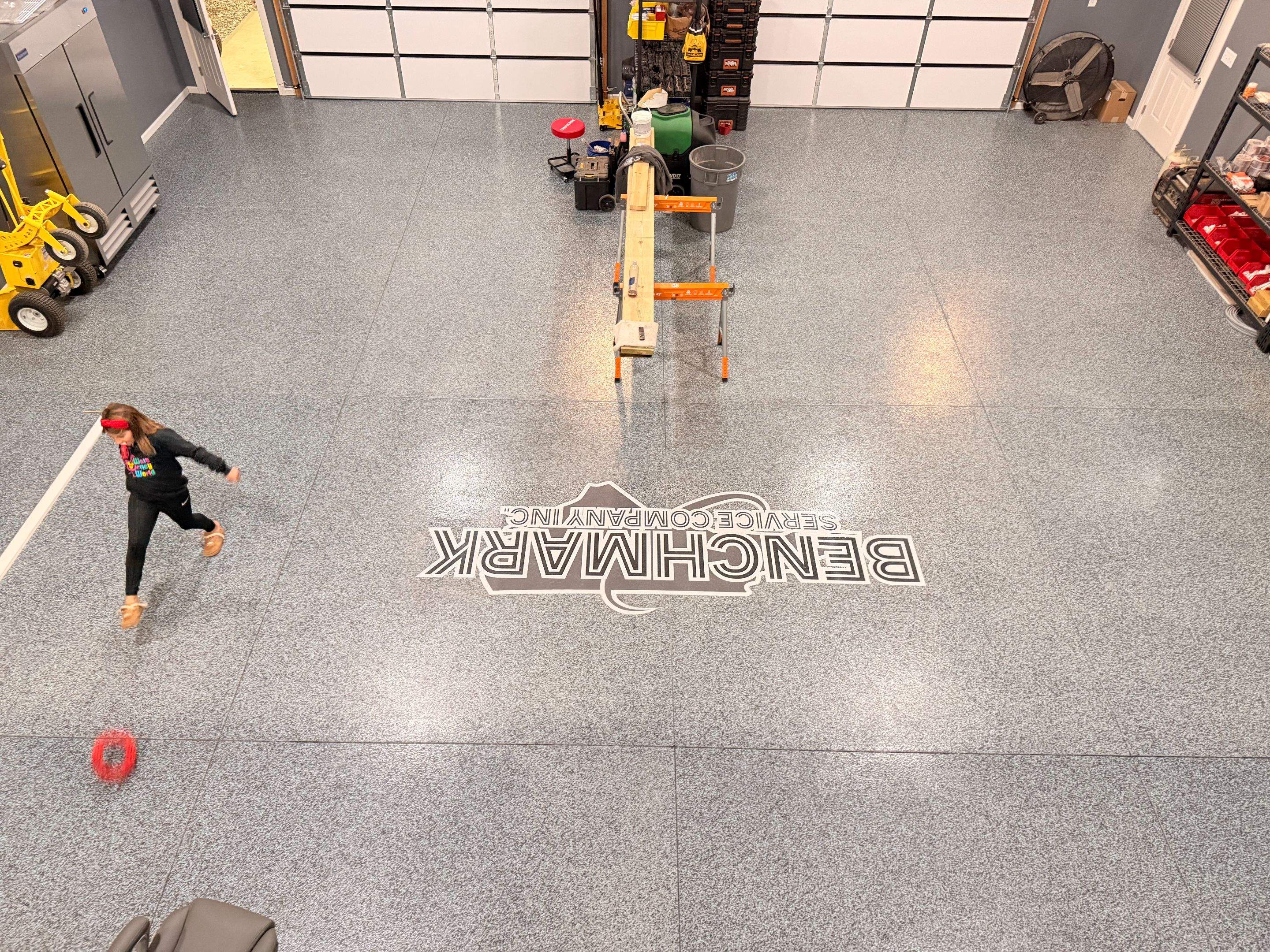 Custom Flake Floor and Company Logo by Endure Concrete Coatings