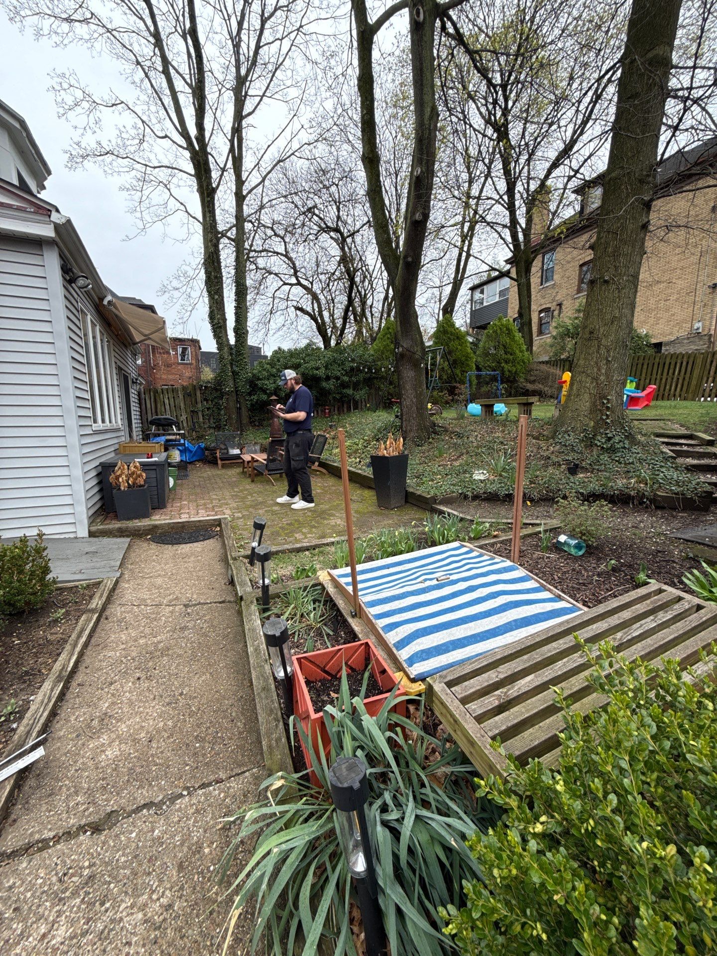 Stamped Concrete and Retaining Wall by Cousins Roofing Siding & Decks