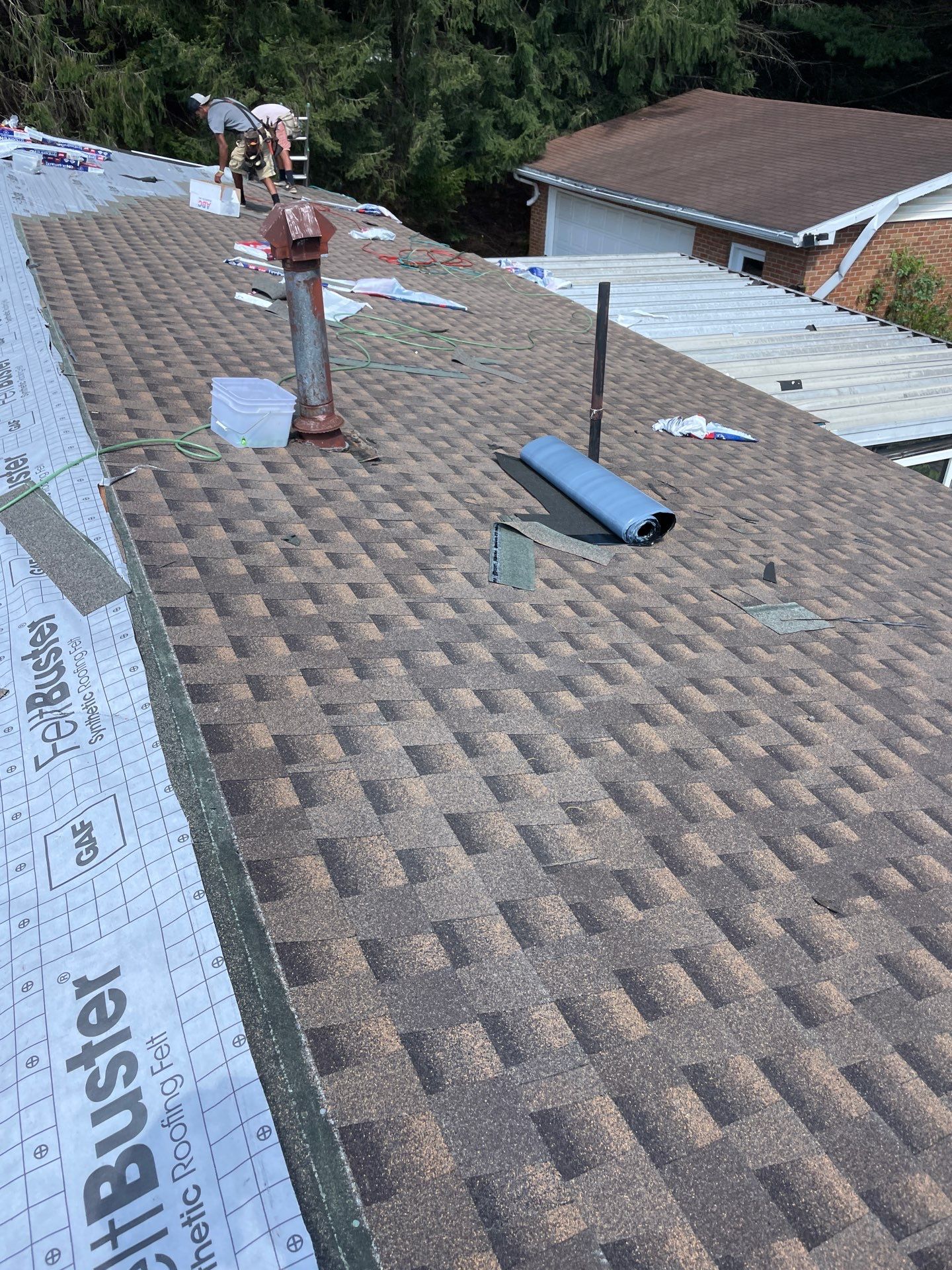 Residential Roofing Installation using GAF TImberline HDZ Hickory by Rainstoppers Roofing