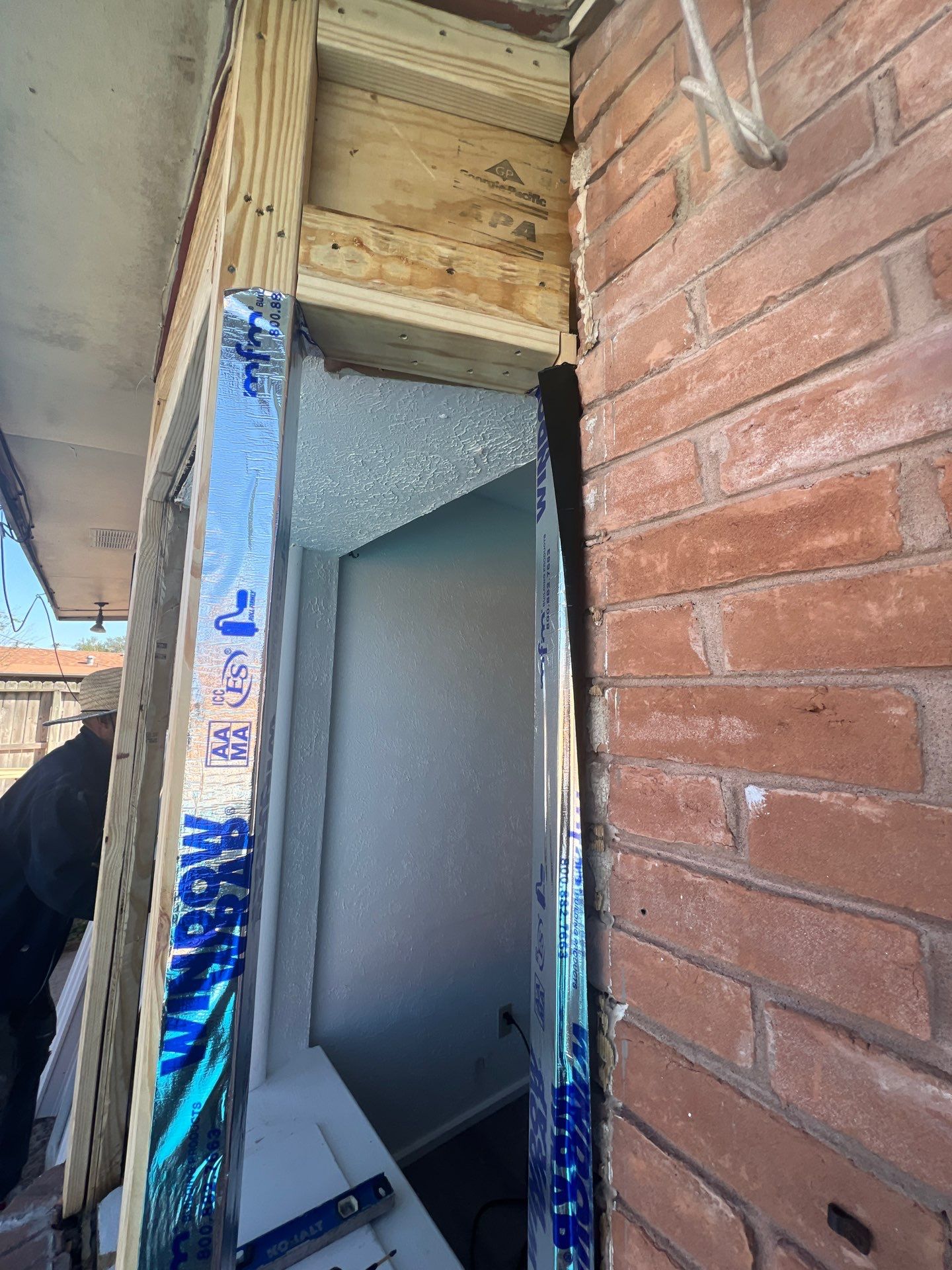 Windows in Brick with a Bay Window by Bayfront Roofing and Construction