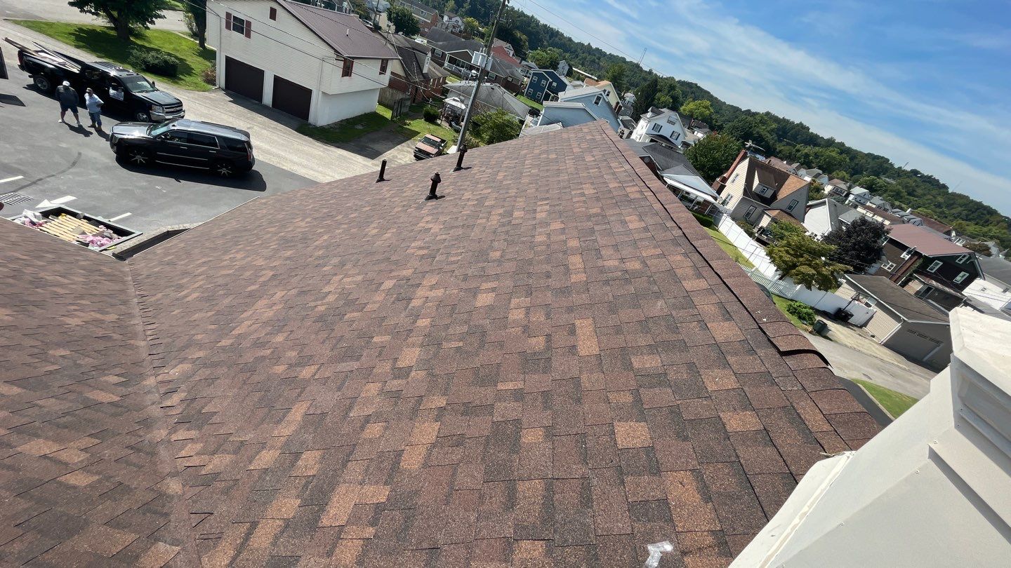 Commercial Roofing Installation using Performance Shingles by Mr. Roofer