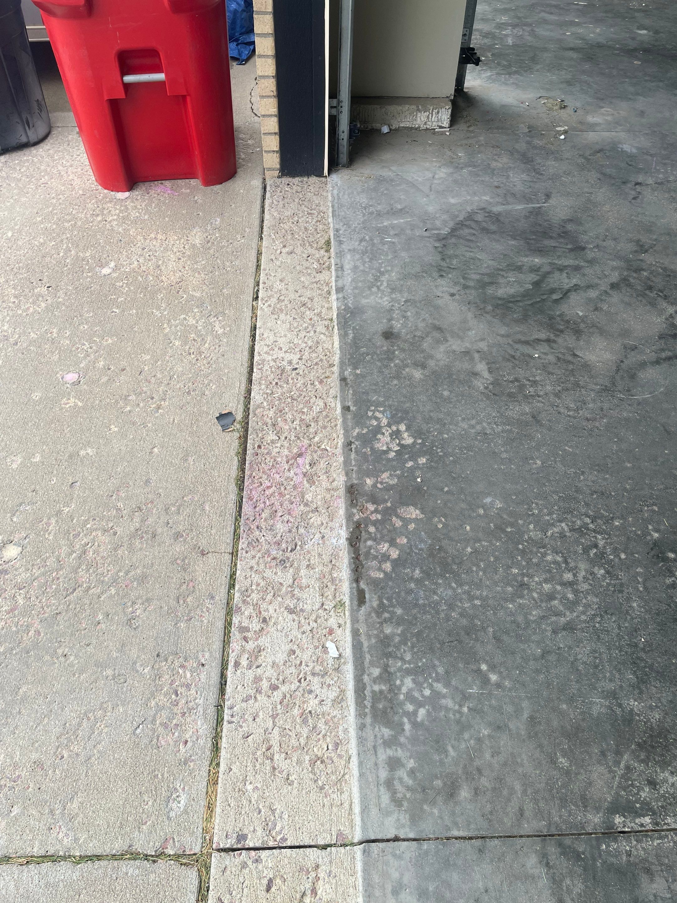 Cabin FEver Flake Garage Floor Coating Installation in Sioux Falls by Select Painting, Coatings & Garage Cabinets