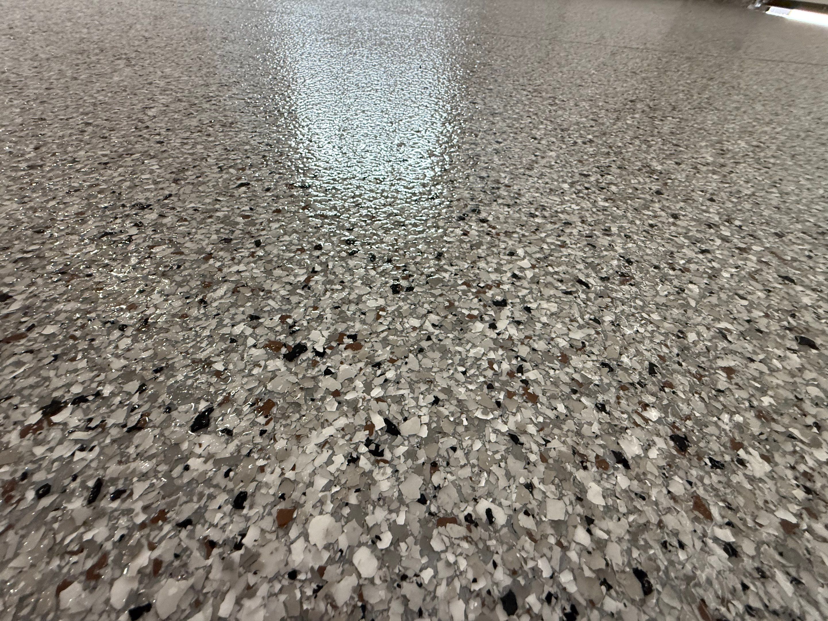 High-Gloss Epoxy Flake Garage Floor Coating in Brandon by Select Painting, Coatings & Garage Cabinets
