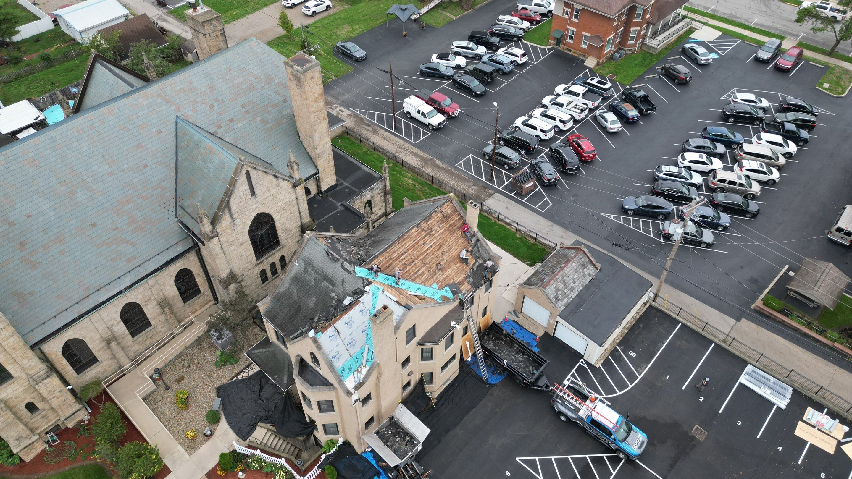 Commercial Roofing Installation using Standing Seam Metal - Frost Black by RoofX 