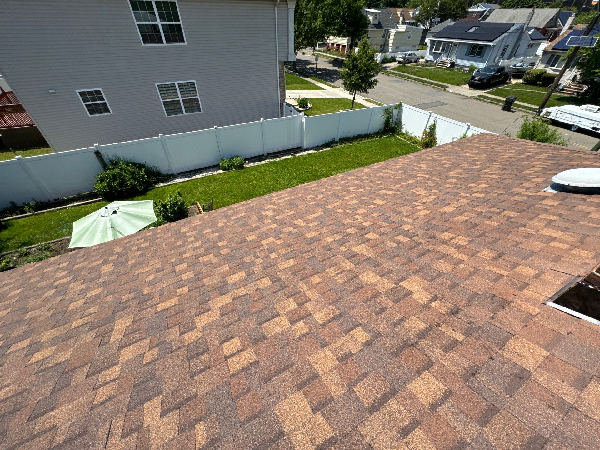 Brownwood Shingles by Reimagine Roofing