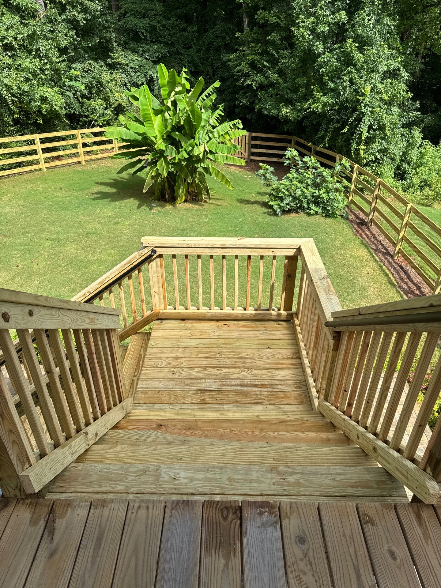 Elevated Deck Stair Construction and Paver Patio in Marietta by Swift Home Renovations