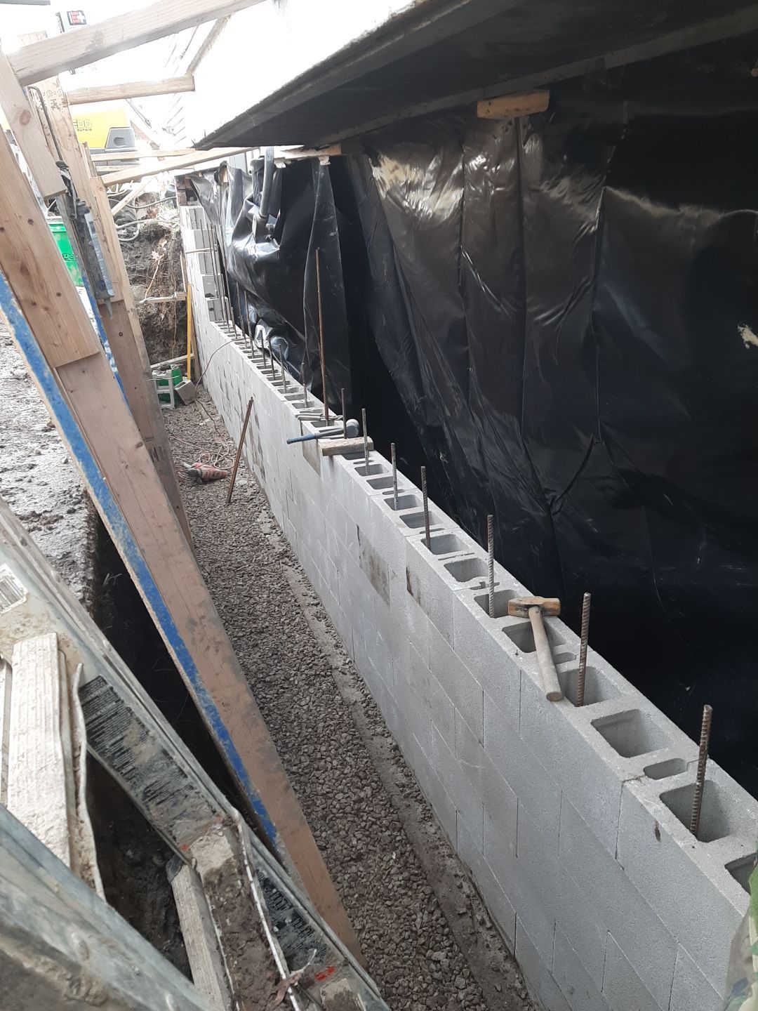 Basement Wall Rebuild with Exterior Waterproofing by Toledo Basement Repair