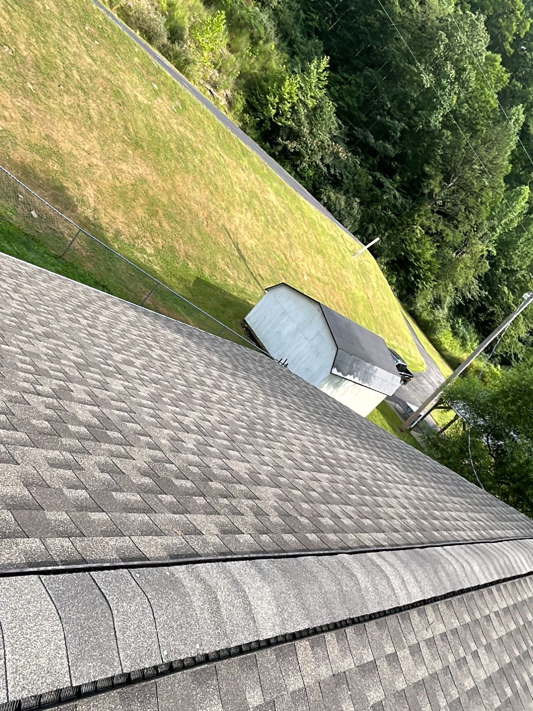 Residential Roofing Installation using Performance Shingles by Mr. Roofer