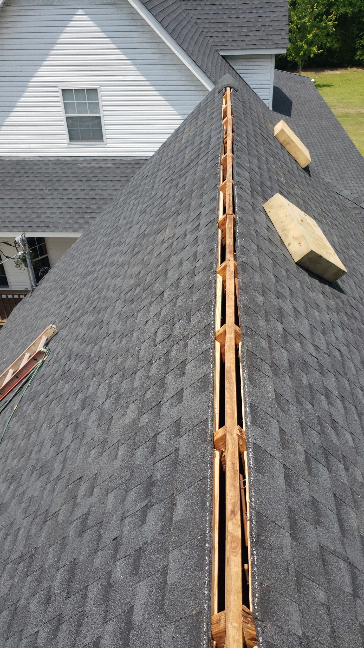 Residential Roofing Installation using Roof Replacement by American Roofing & Construction LLC