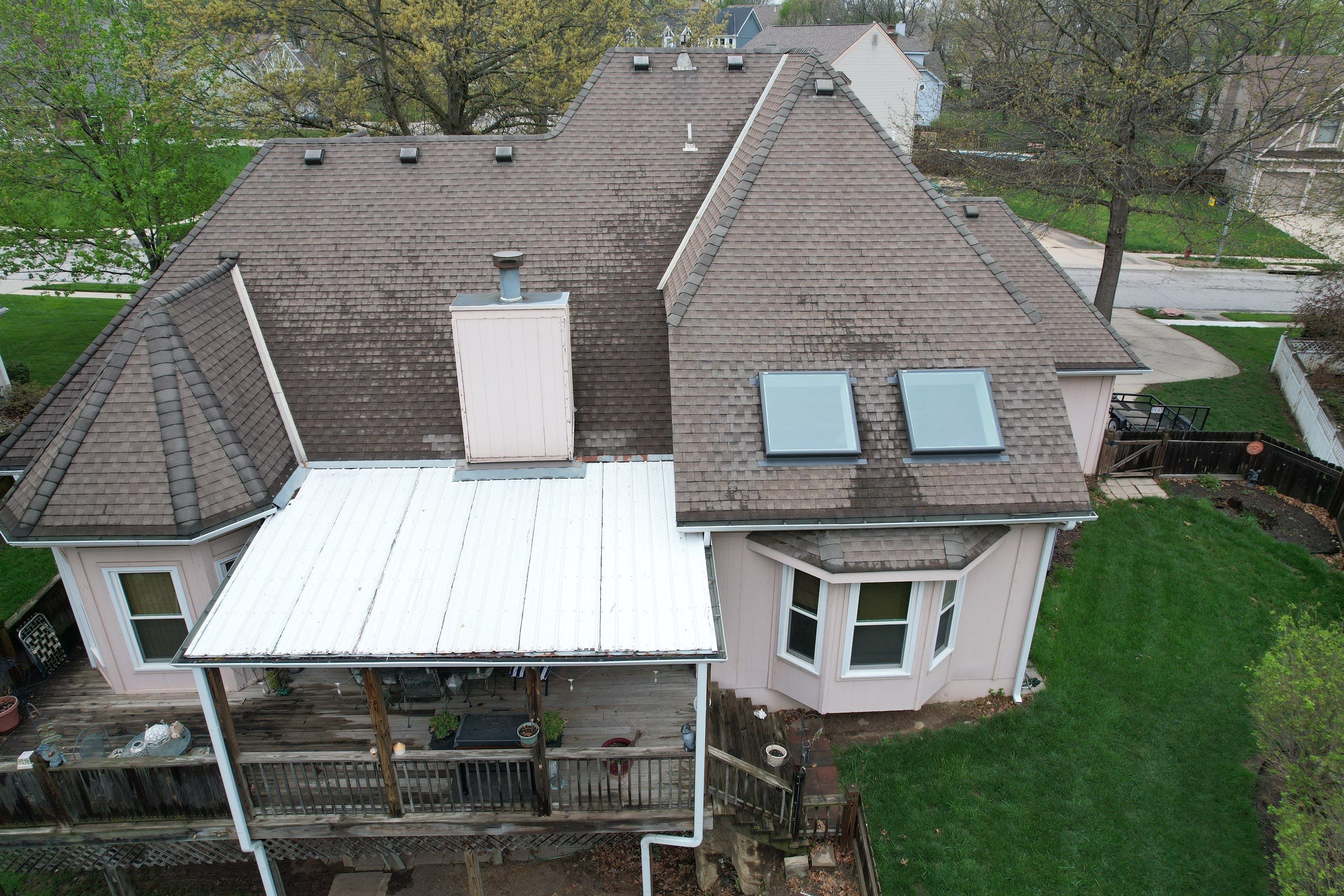 Comprehensive Roof Replacement and Skylight Installation in Kansas City by Liberty Roofing