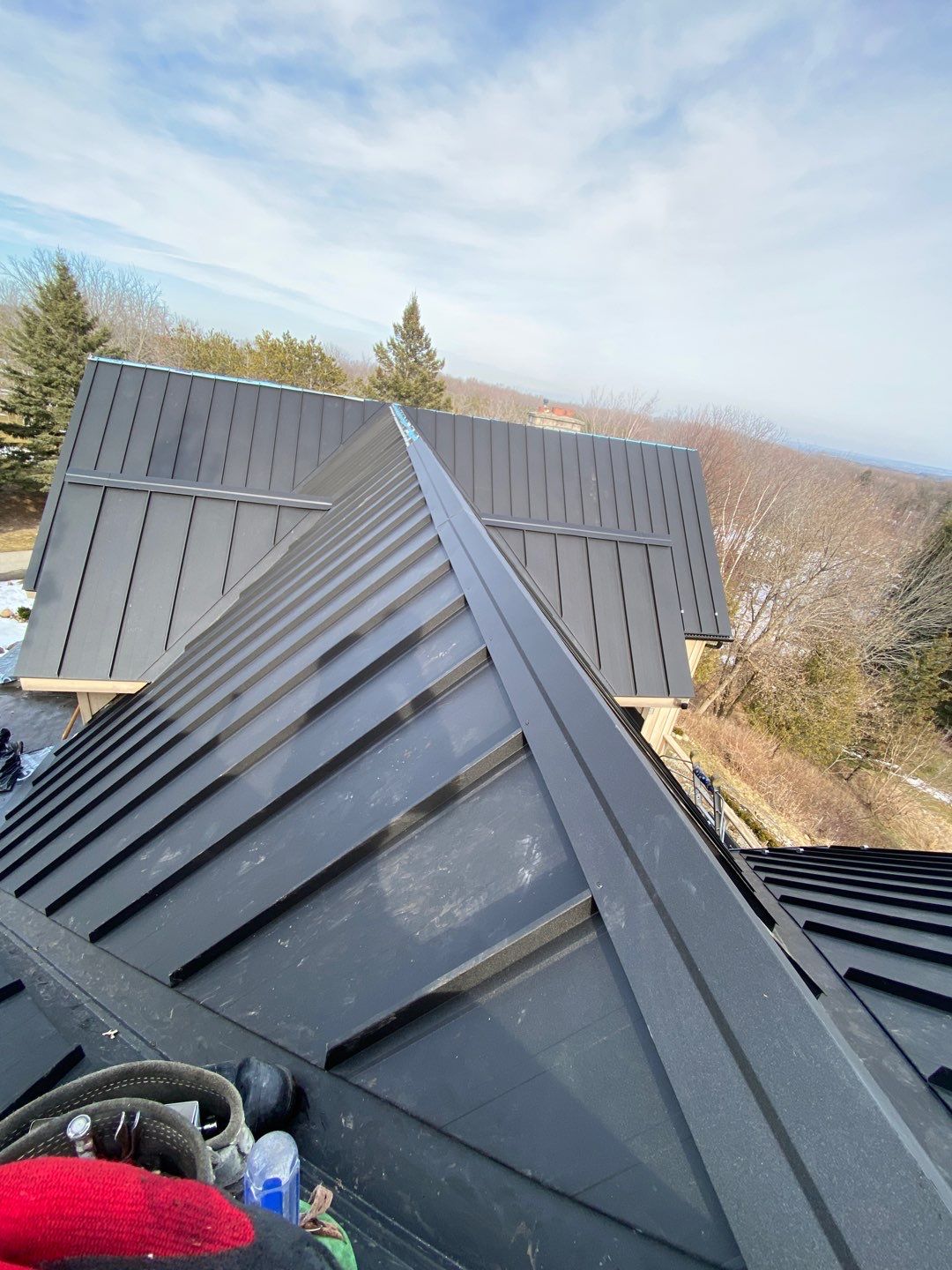 Residential Roofing Installation using 24 Ga Standing Seam Metal by Jay Carter Roofing & Sheet Metal