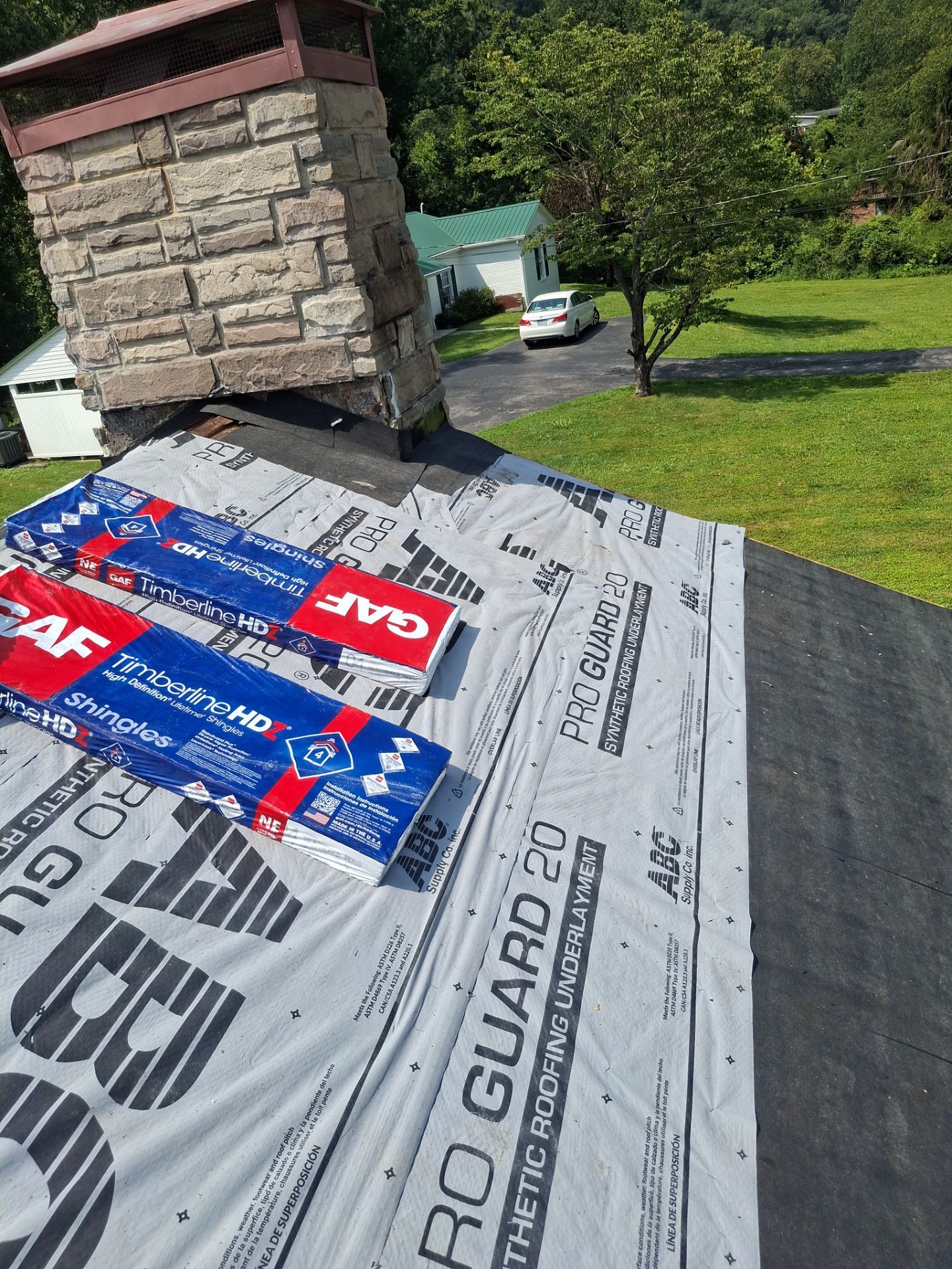 Residential Roofing Installation using GAF Timberline HDZ Weatherer Wood by Rainstoppers Roofing