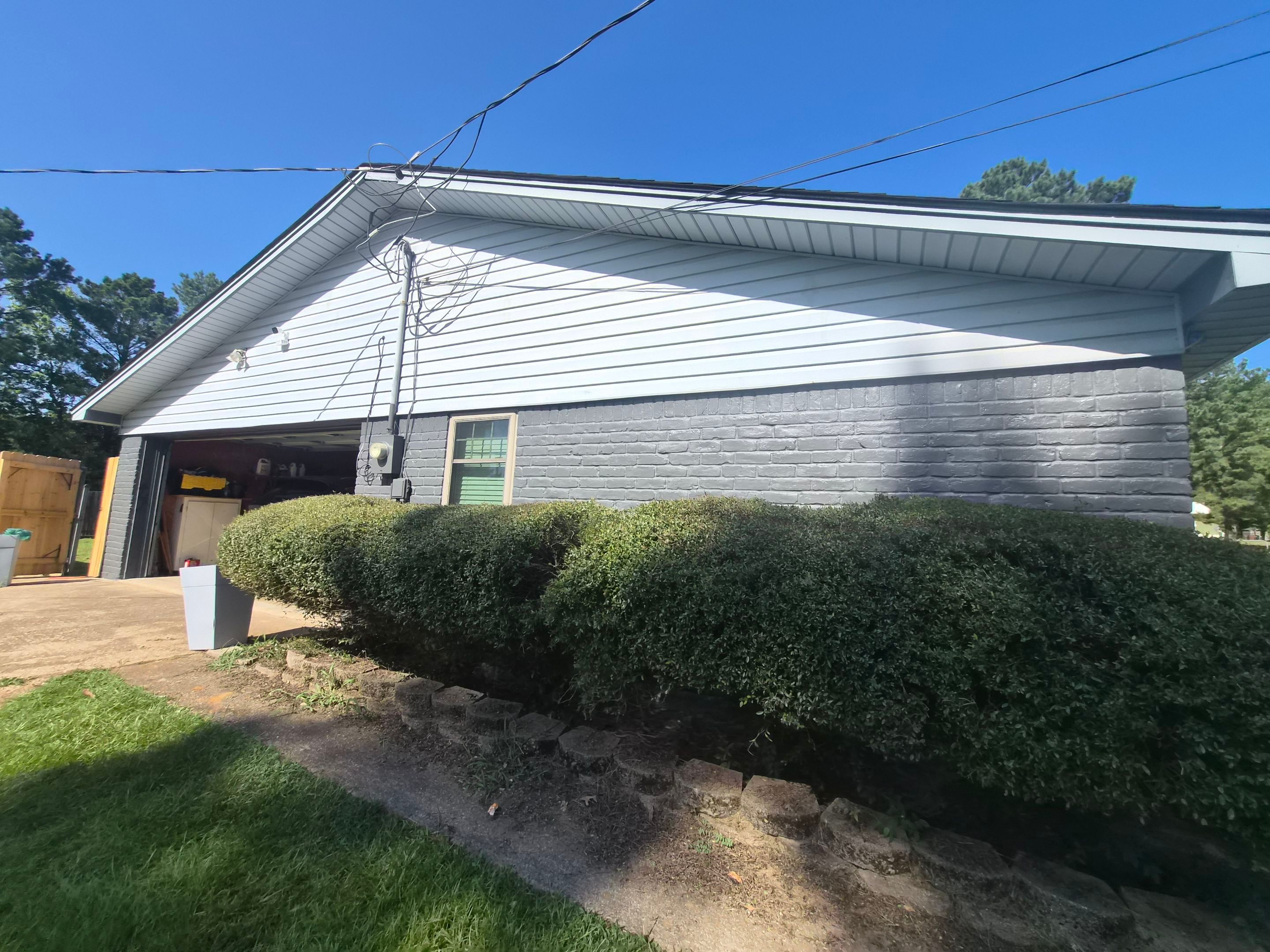 Exterior Refresh Brick Painting Job in Overton, TX by Quality Coats Painting