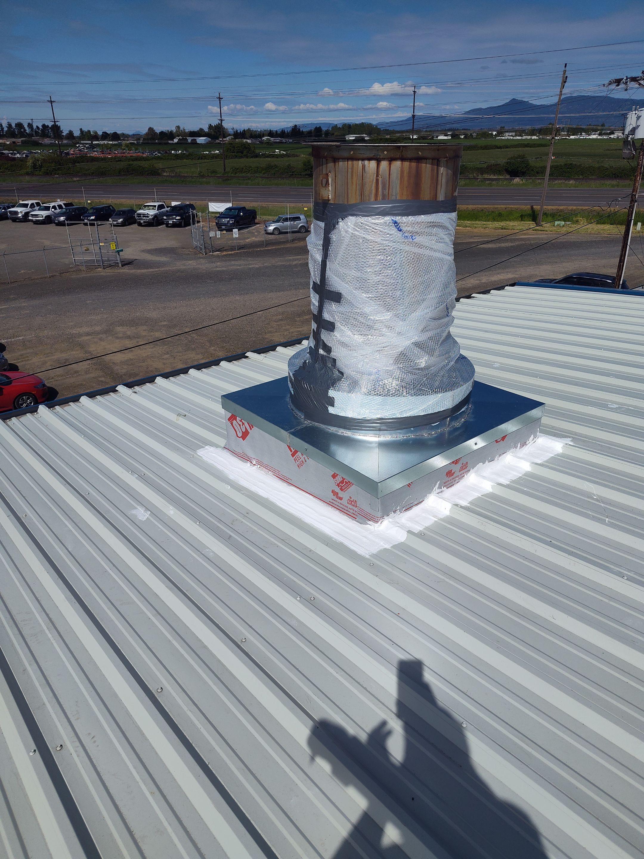 Installing New Curbs on a Metal Roof for new equipment by BEST Roofing & Waterproofing