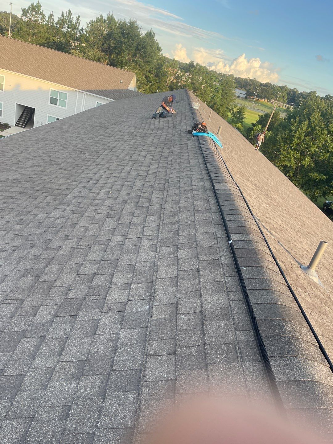 Residential Roofing Installation using Roof Replacement by American Roofing & Construction LLC