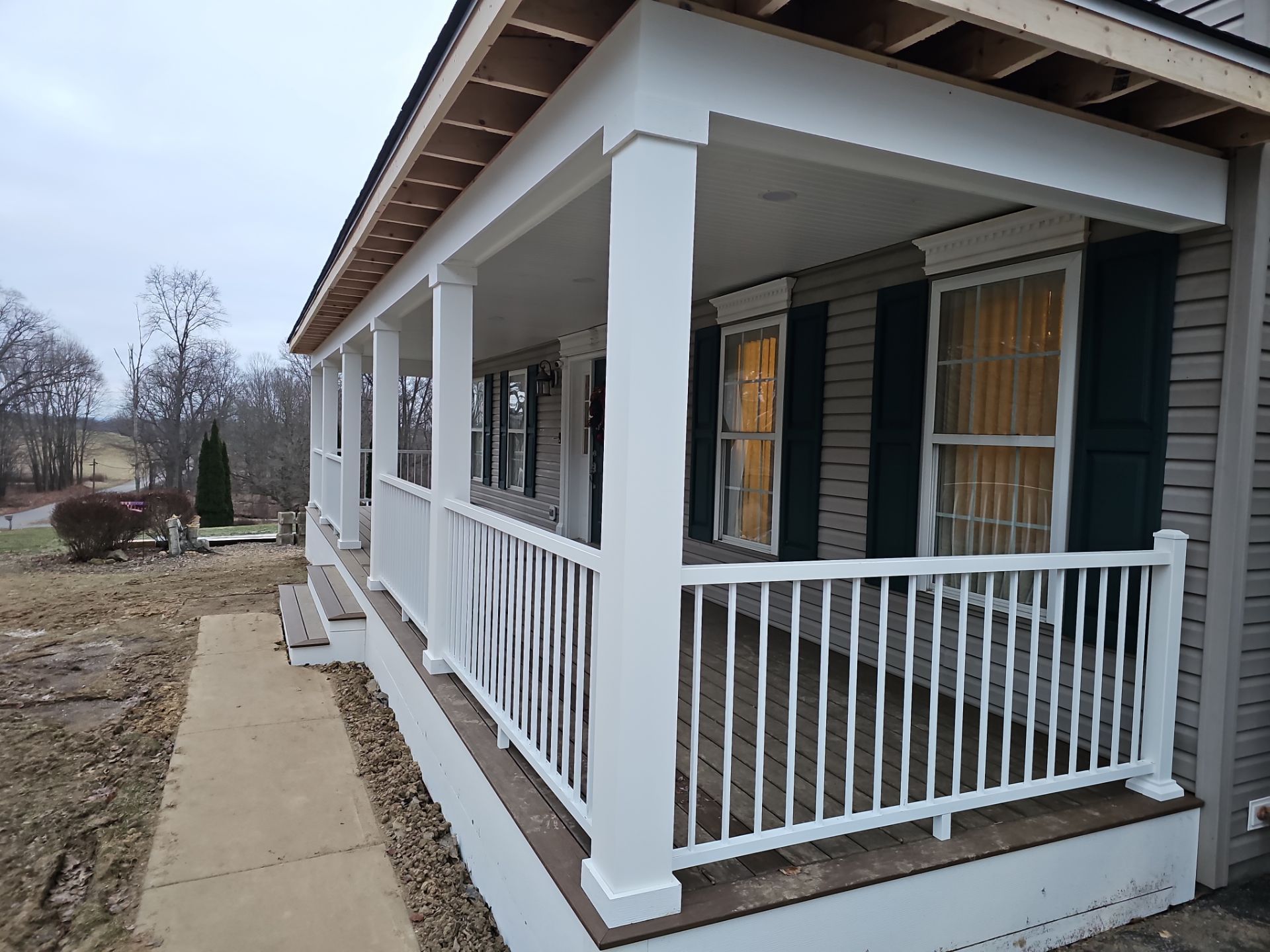 Porch by Cousins Roofing Siding & Decks