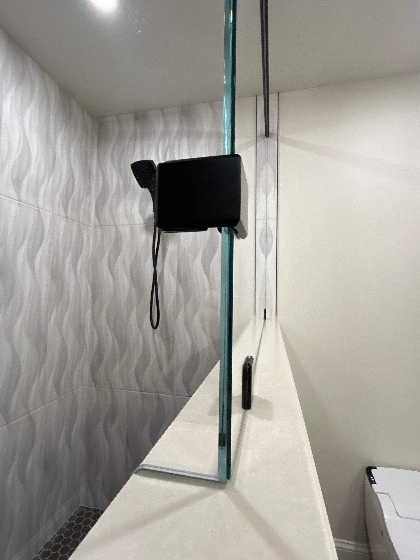 Frameless Shower Enclosure w/Header Bar by Cheshire Glass Company