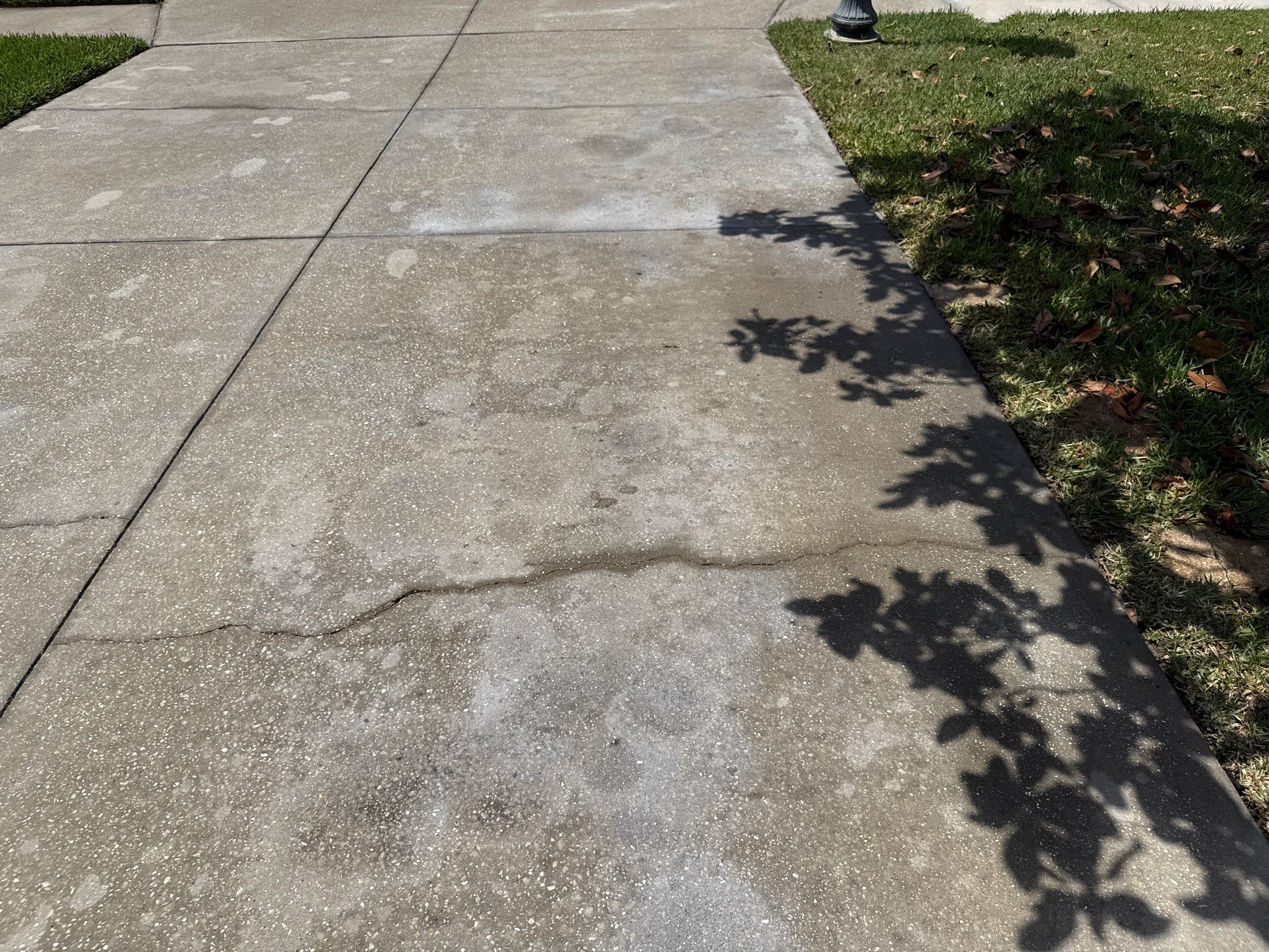 Concrete Driveway Oil Stain Removal | Harrison Ranch Community | Parrish, FL by Sunshine AquaWash