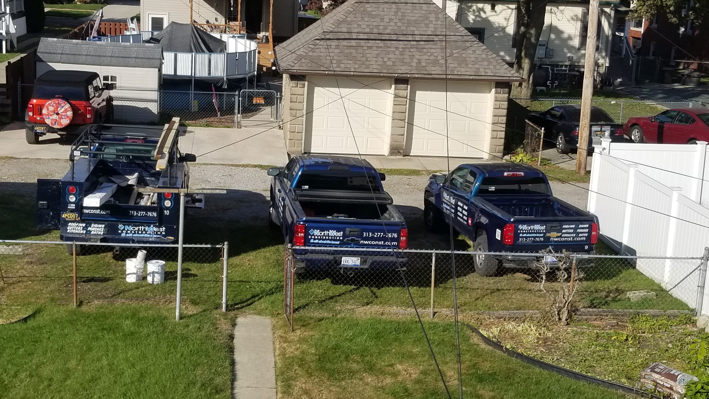 Rebuild balcony flat roofing TREX decking stairway and Railings in Wyandotte, MI by Northwest Construction 