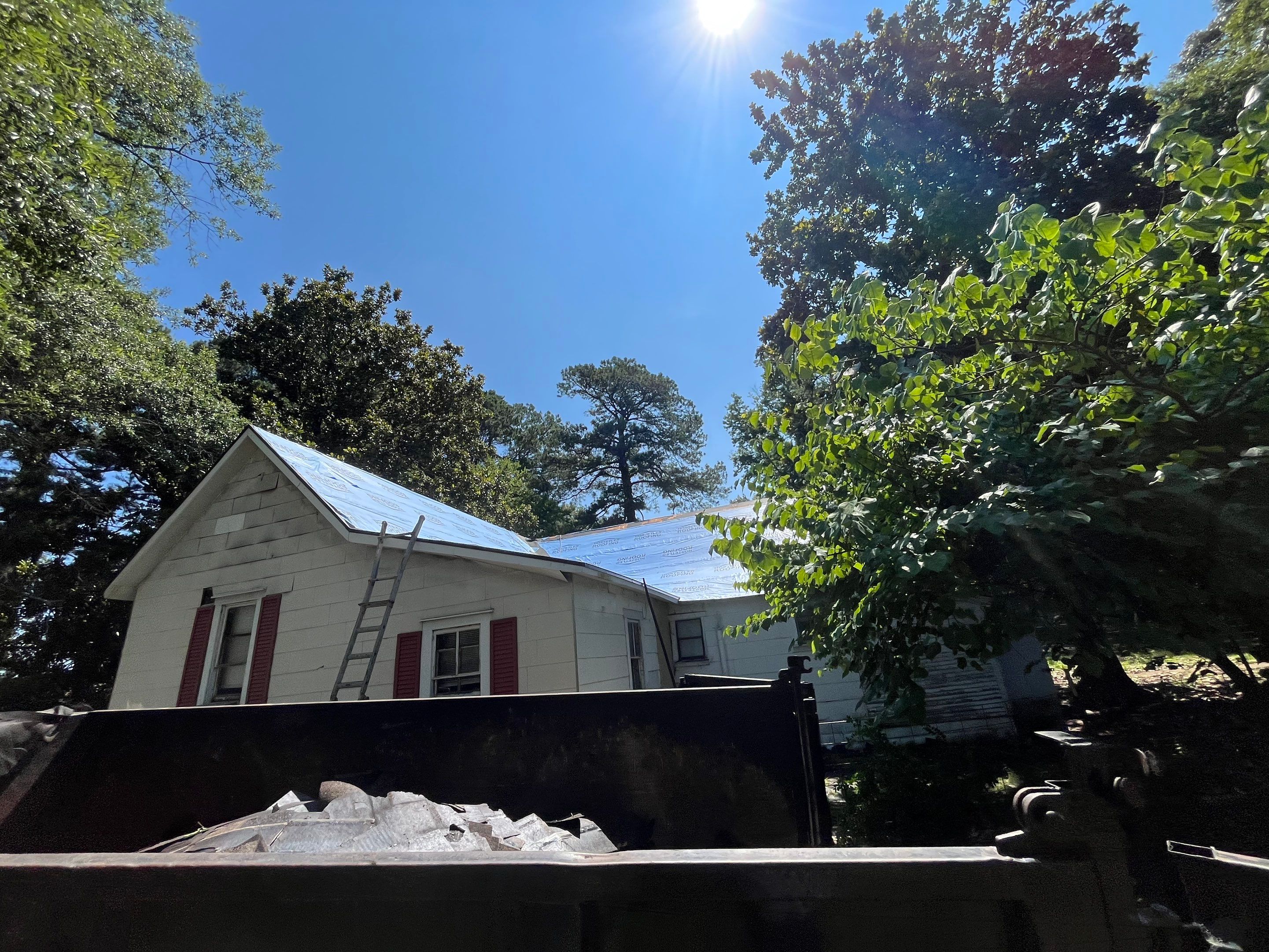 Storm Restoration Reroof: 25 Year 3-Tab Shingle by Hostetler Roofing