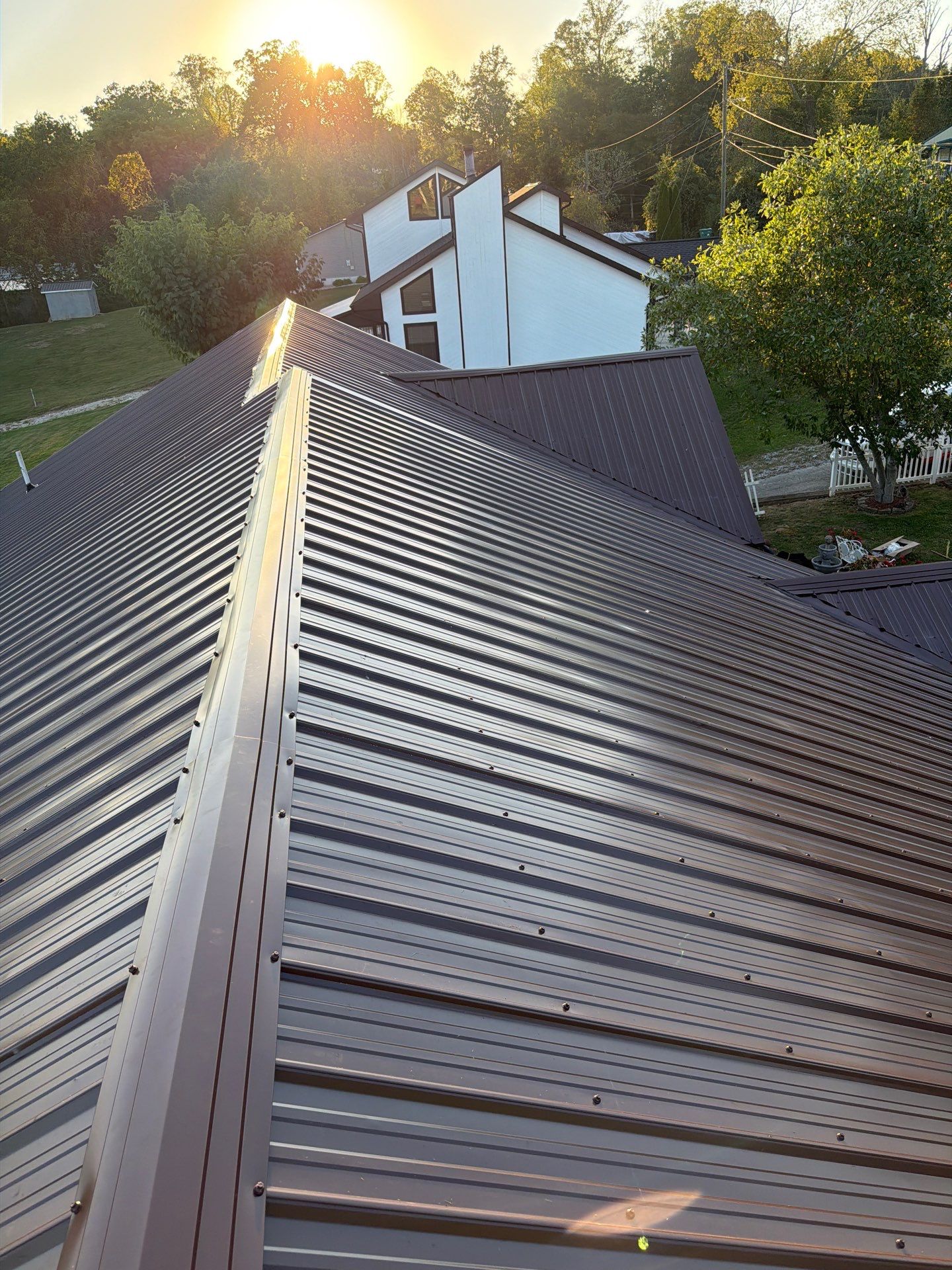 Residential Roofing Installation using Metal by Rainstoppers Roofing