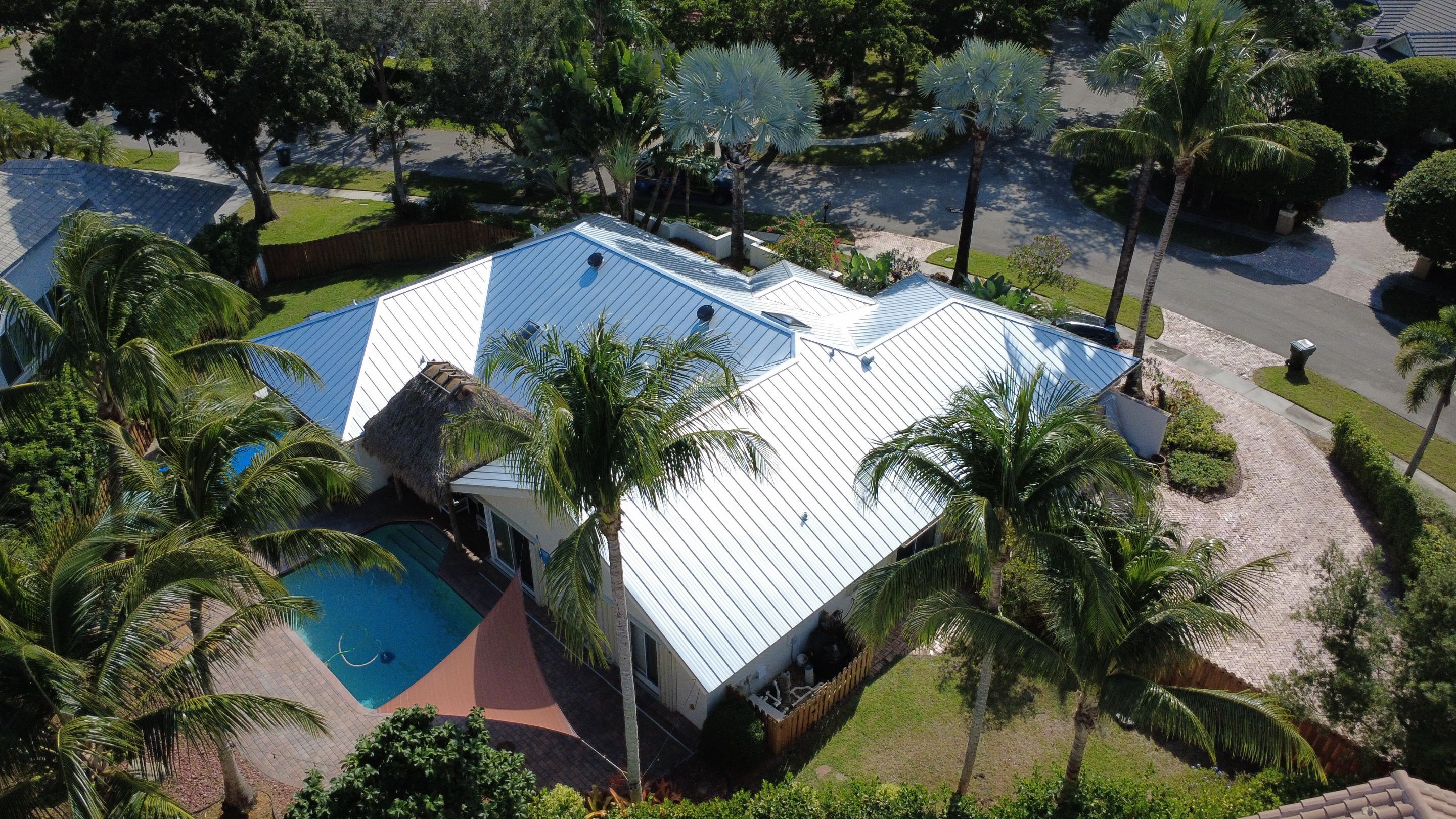 Residential Roofing Installation using 1" Nail strip metal roof by BLUES BROTHERS CONSTRUCTION CORP