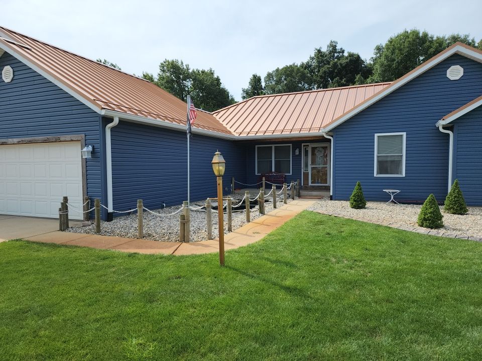 Residential Roofing and Siding Installation using Copper Penny Standing Seam by 4Ever Metal Roofing