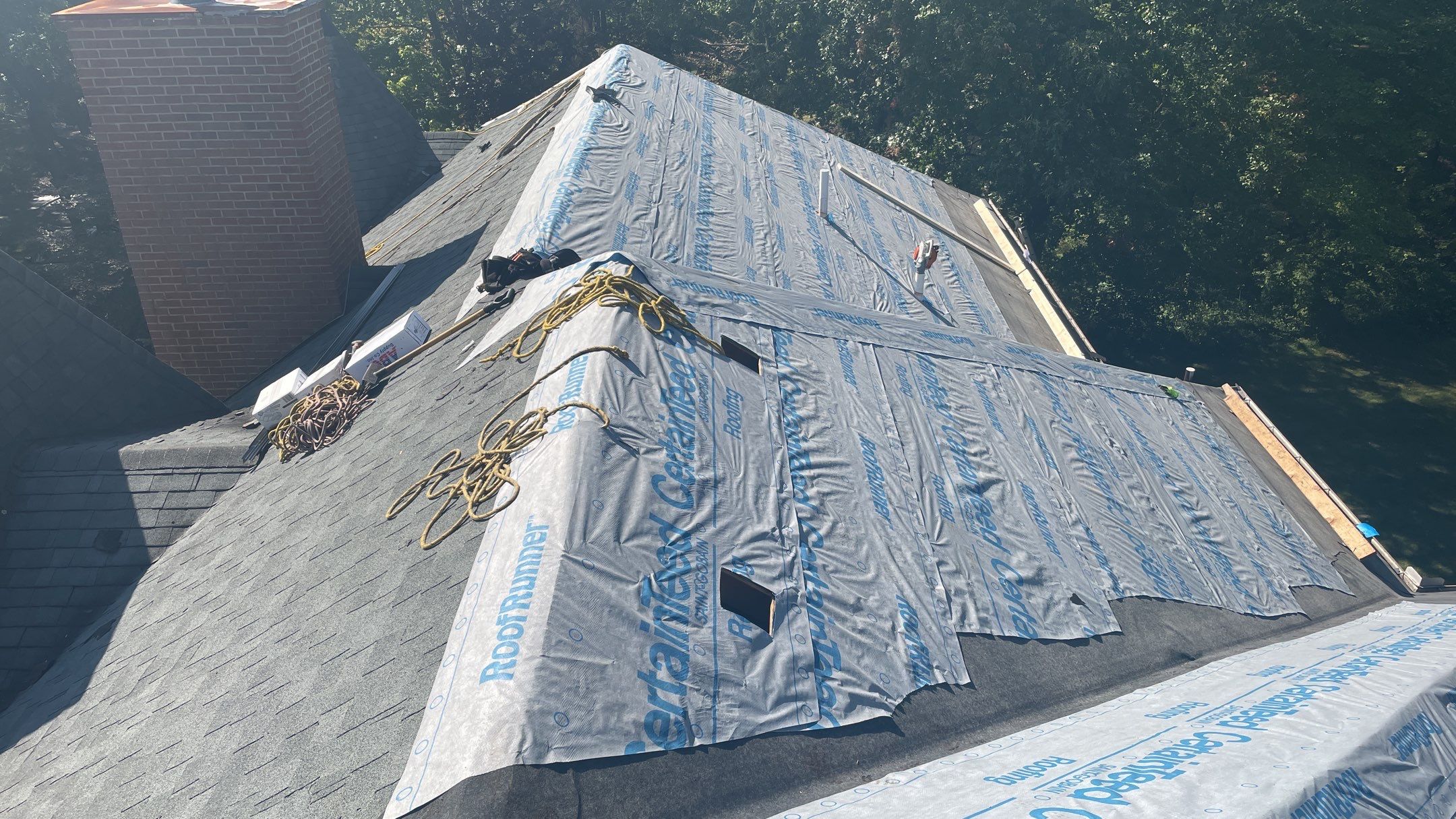 Roof Replacement using CertainTeed Landmark Moire Black by 180 Contractors